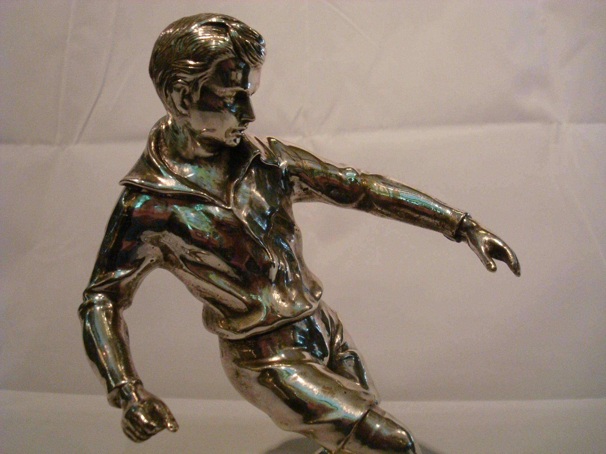 soccer player statue