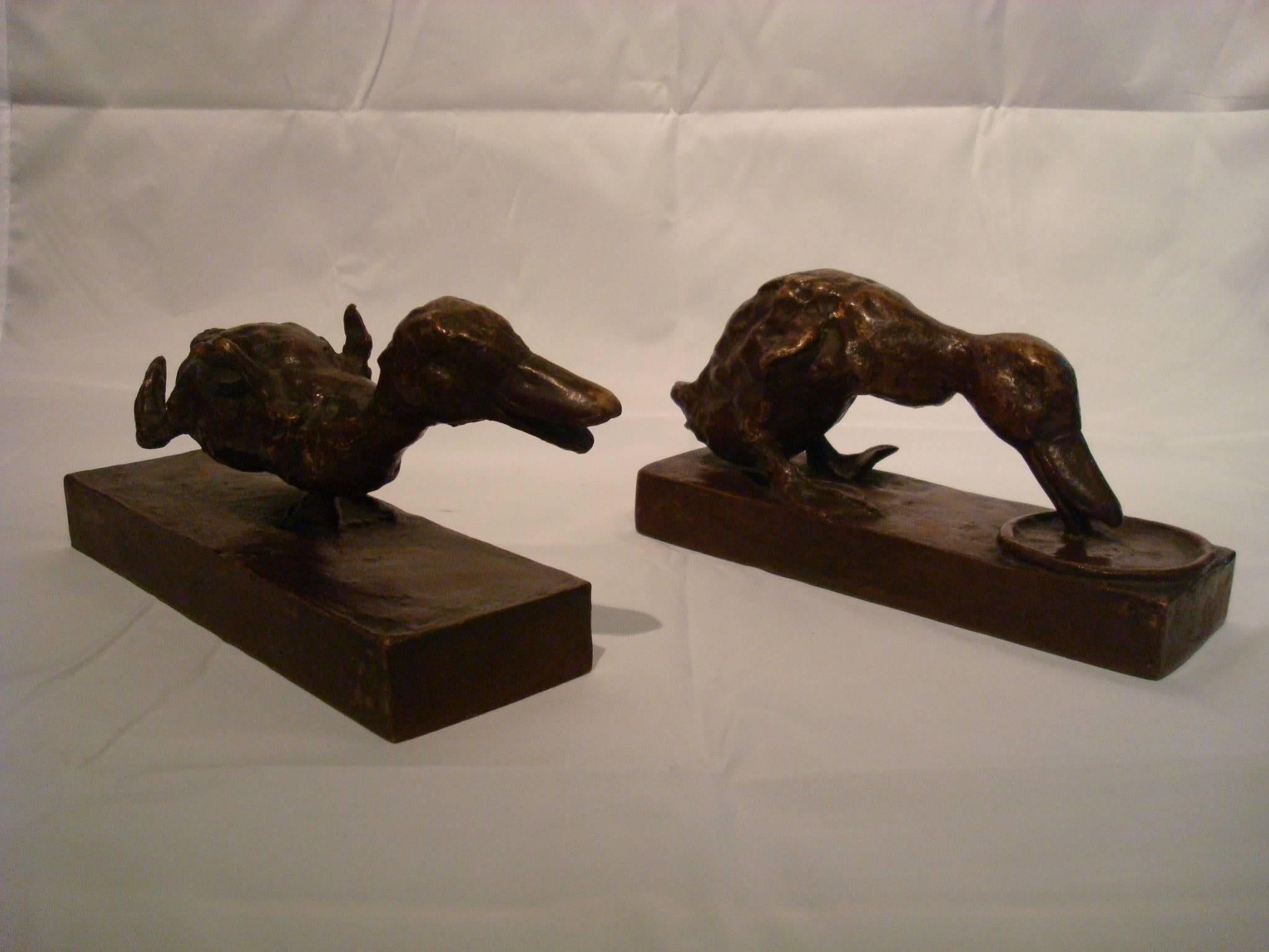 A pair of young ducks bookends (running and eating). Very rare model. Lost Wax Foundry method. Each signed "E·B· PARSONS " and stamped "Kunst Foundry NY," in the bases. Bronze with brown original patina.
Condition: Wear and