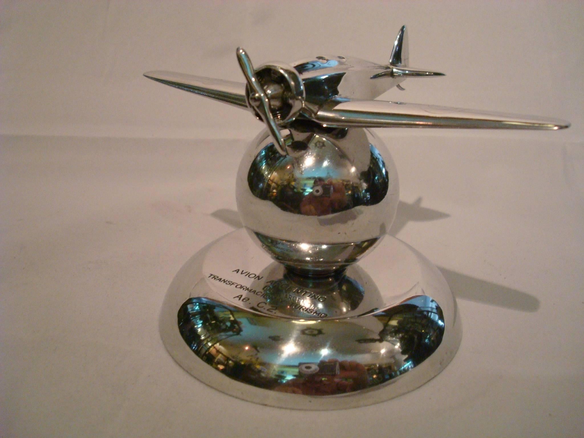 Polished Art Deco Airplane Fighter over the World Paperweight, 1930s