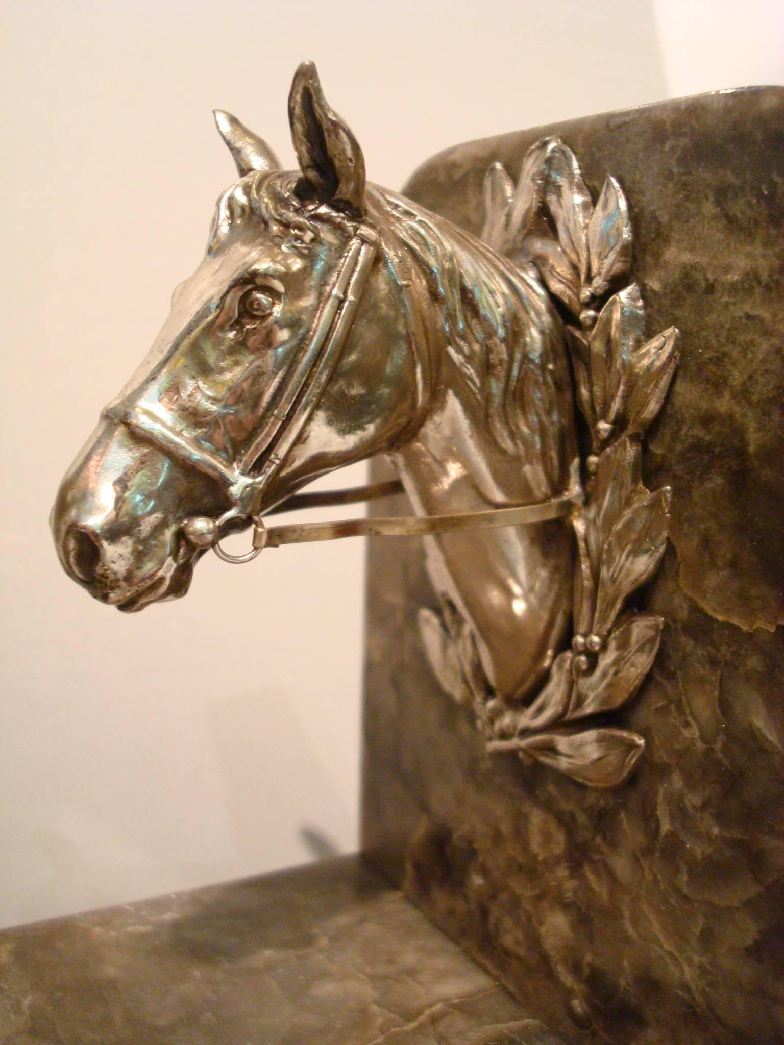 Lovely pair of horse busts over marble bases. Perfect for a polo fan.