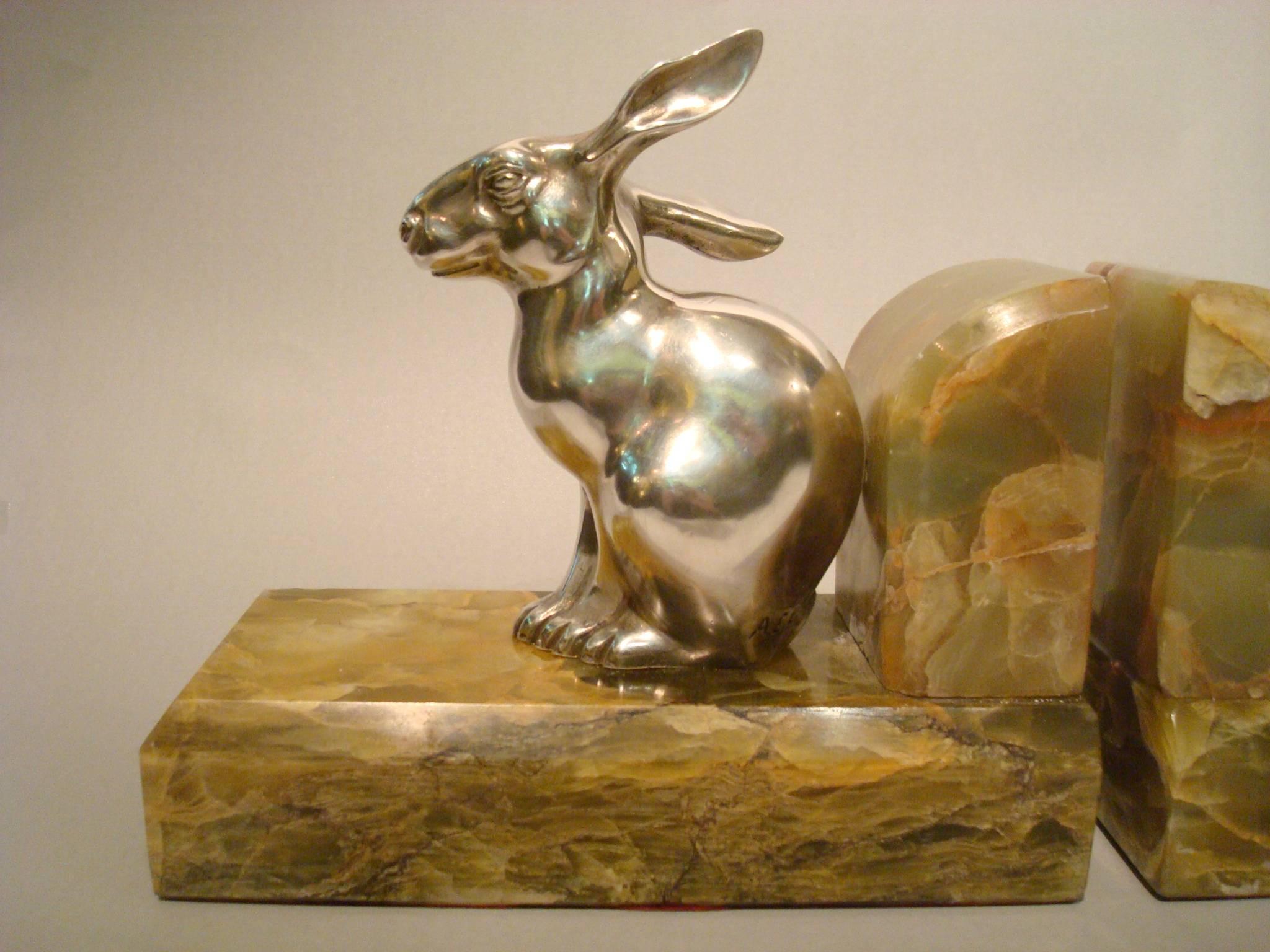 Very nice Art Deco rabbit, hare silver plated bronze bookends. Signed A.E.L. , stamped France and 28. Mounted Over Russian Onix.