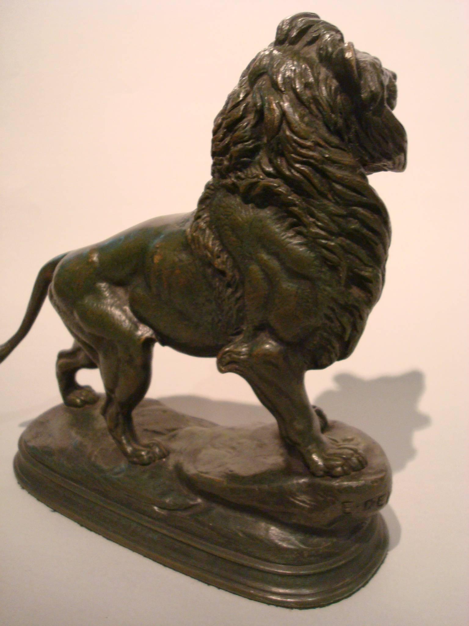 A superb 19th century French animalier sculpture of a roaring Lion standing on a rocky outcrop, finely modelled with good dark green patination signed E. Delabrierre.
This model was exhibited at the Paris Salon in 1866.
Paul Édouard Delabrierre