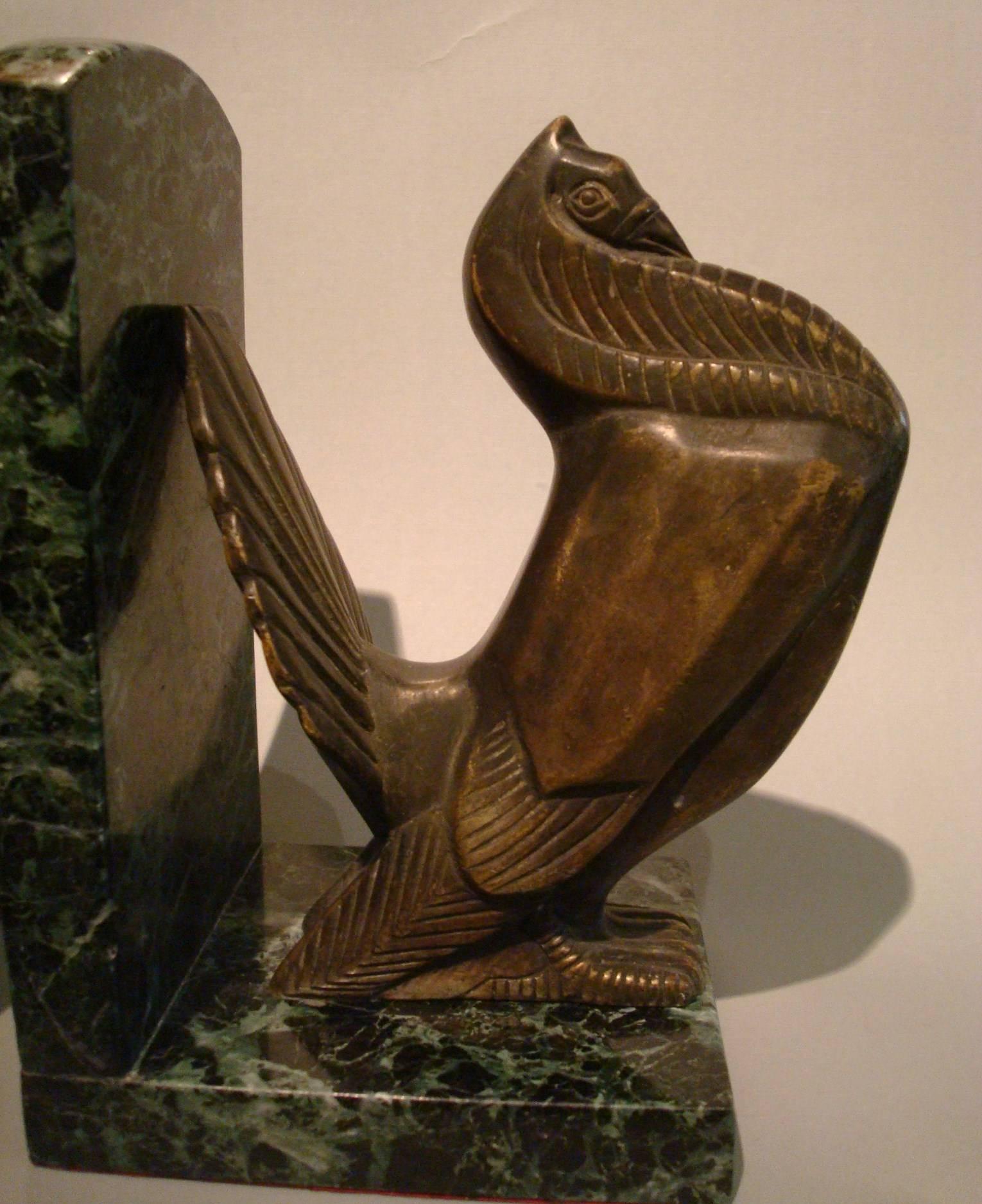 Art Deco Turkey bronze bookends signed Irenee Rochard. Very nice with original patina, mounted over marble bases.

Irénée René Rochard (French, 1906 ~ 1984) born in Villefranche sur Saône in 1906, his mother was a painter and his brother was the