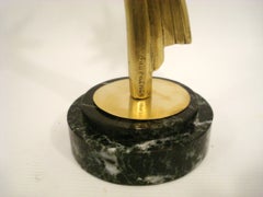 Sculpture Art déco en bronze doré représentant un trophée en forme d'étoile filante, France, 1925
