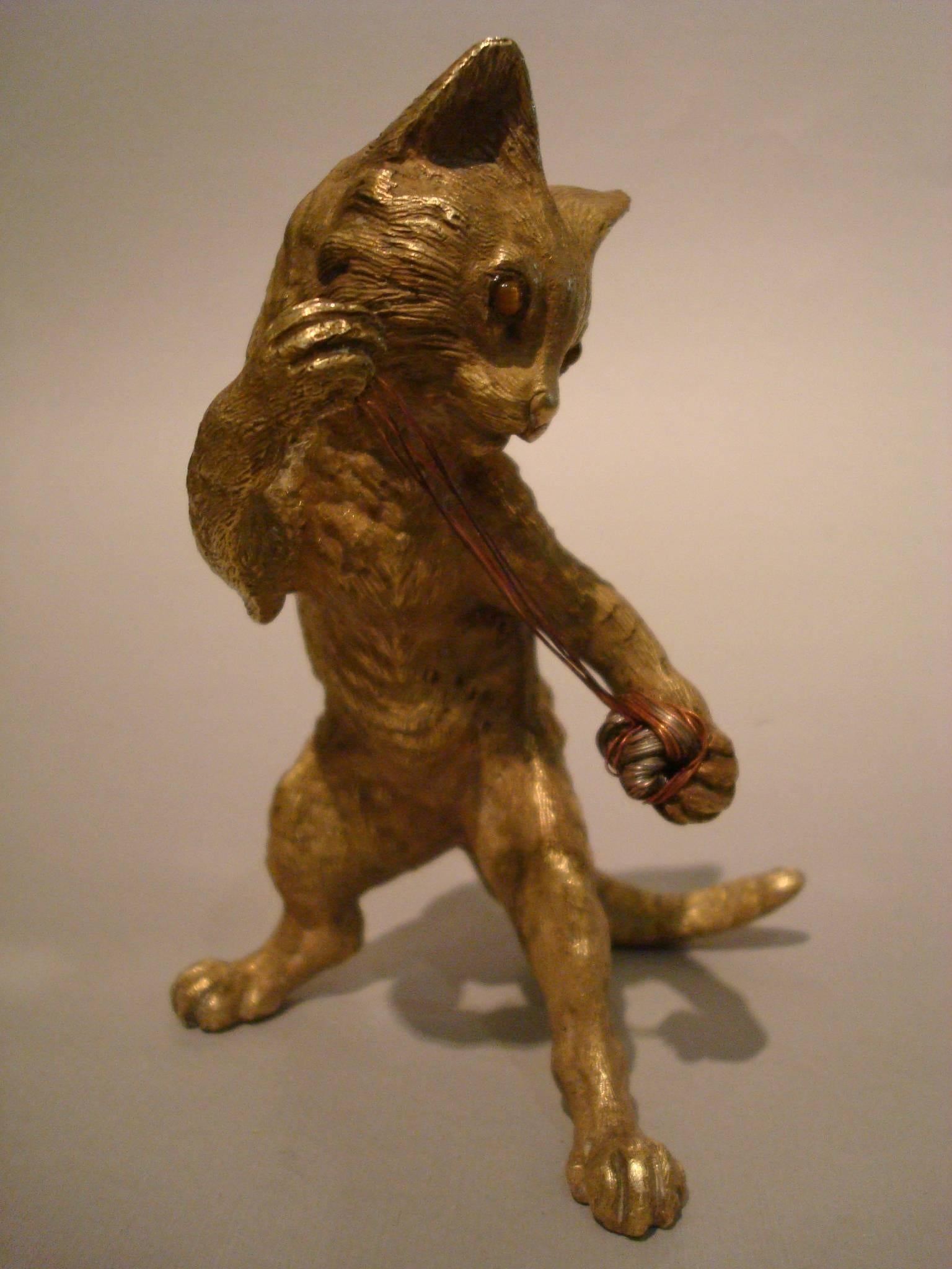 Early 20th Century Austrian Vienna Gilt Bronze Figurine of a Cat Playing with a Ball of Wool