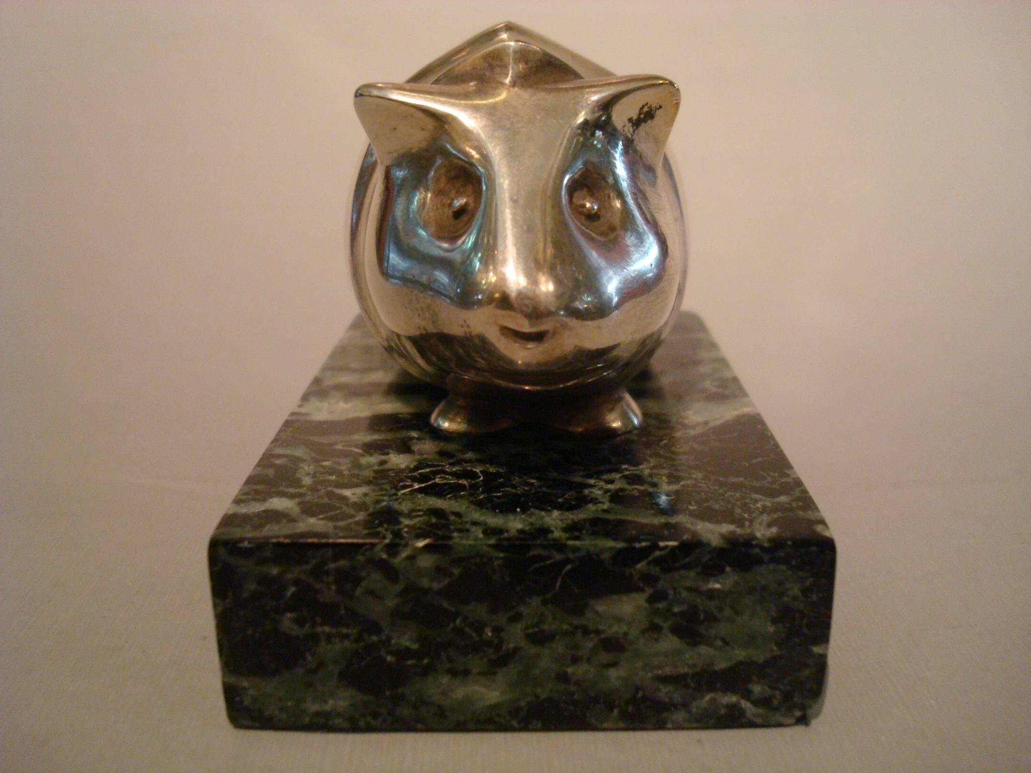 Art Deco Edouard Marcel Sandoz (Swiss, 1881-1971), Guinea pig silver plated bronze paperweight. Mounted over a marble base. Marked: Ed M Sandoz, near the lower edge, also with Susse Fres Ed mark.