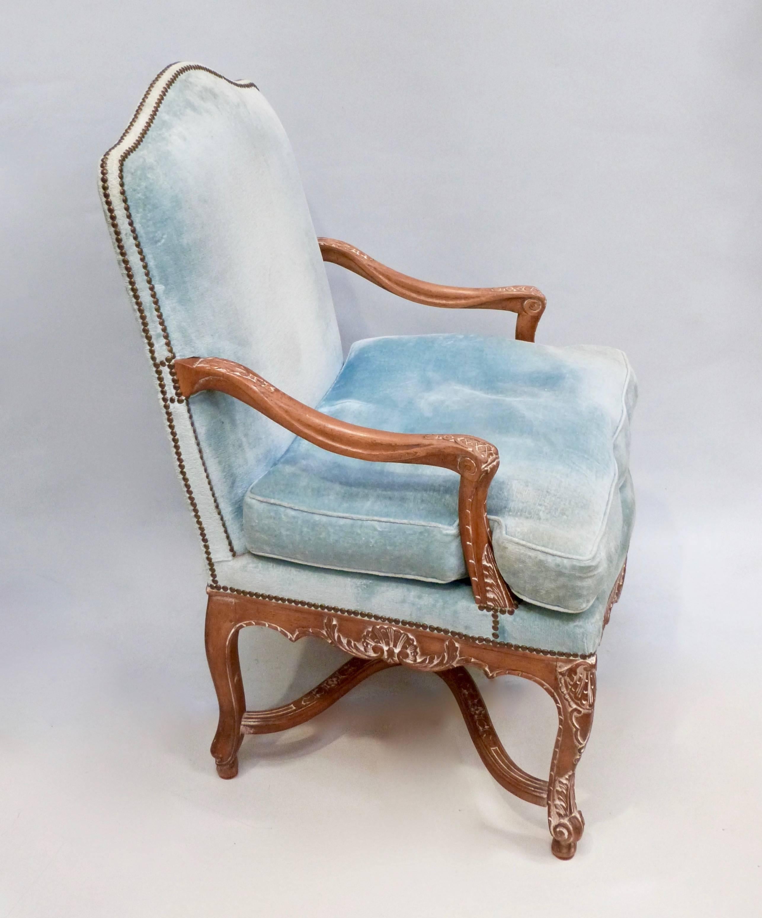 A pair of early 20th century Swedish Rococo style open armchairs.