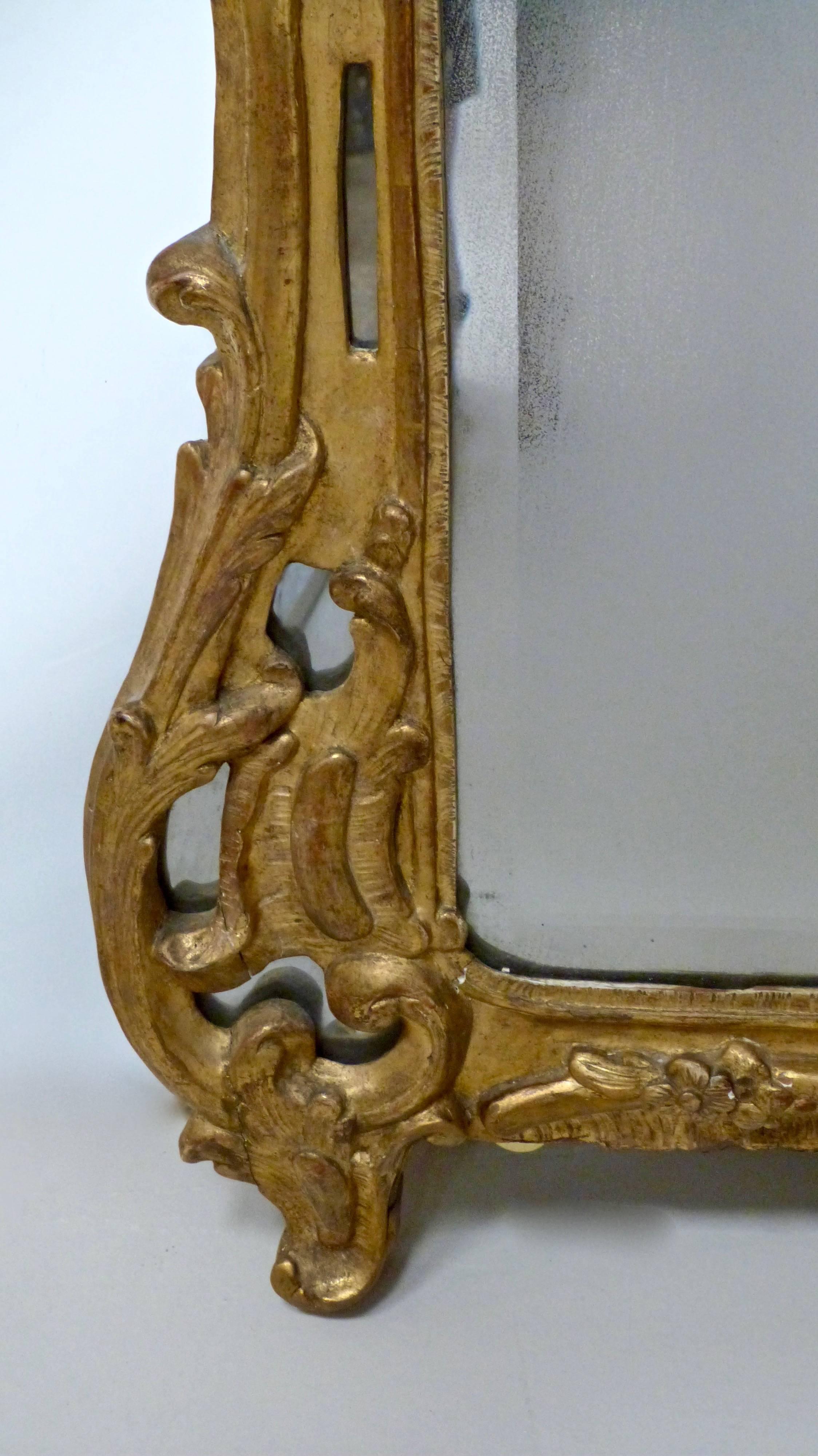 Rococo 18th Century Louis XVI Carved Giltwood Mirror For Sale
