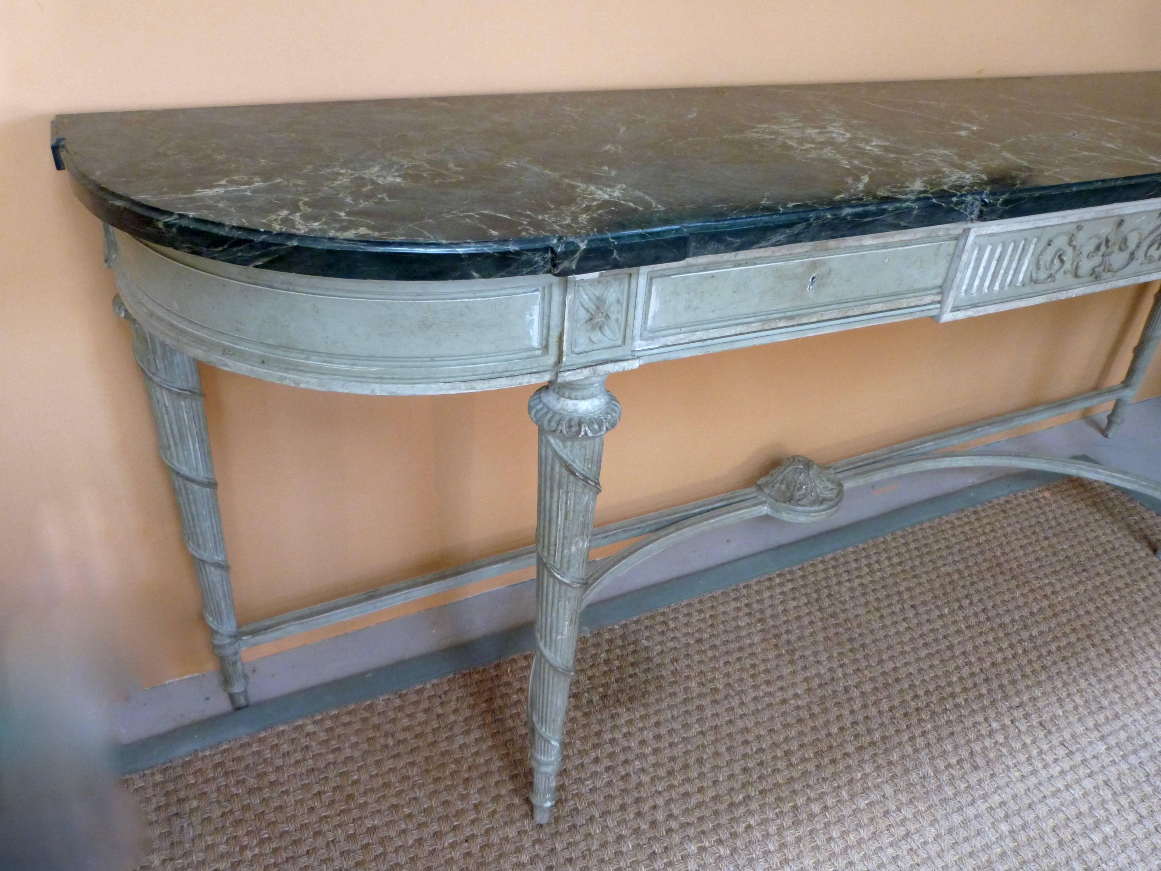 A very decorative early 20th century French painted console table.