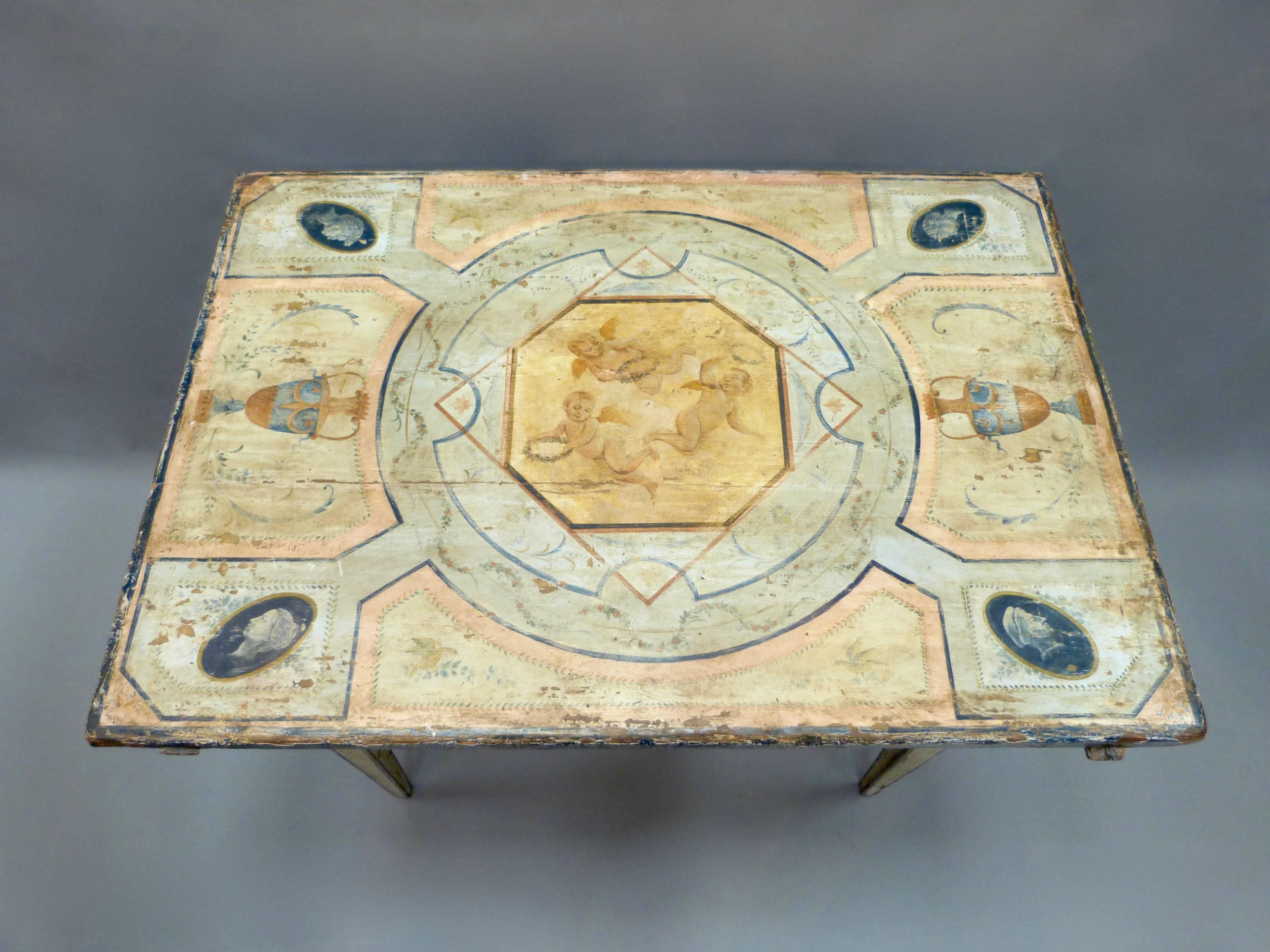 A very decorative 18th century Venetian painted table with a sliding top.