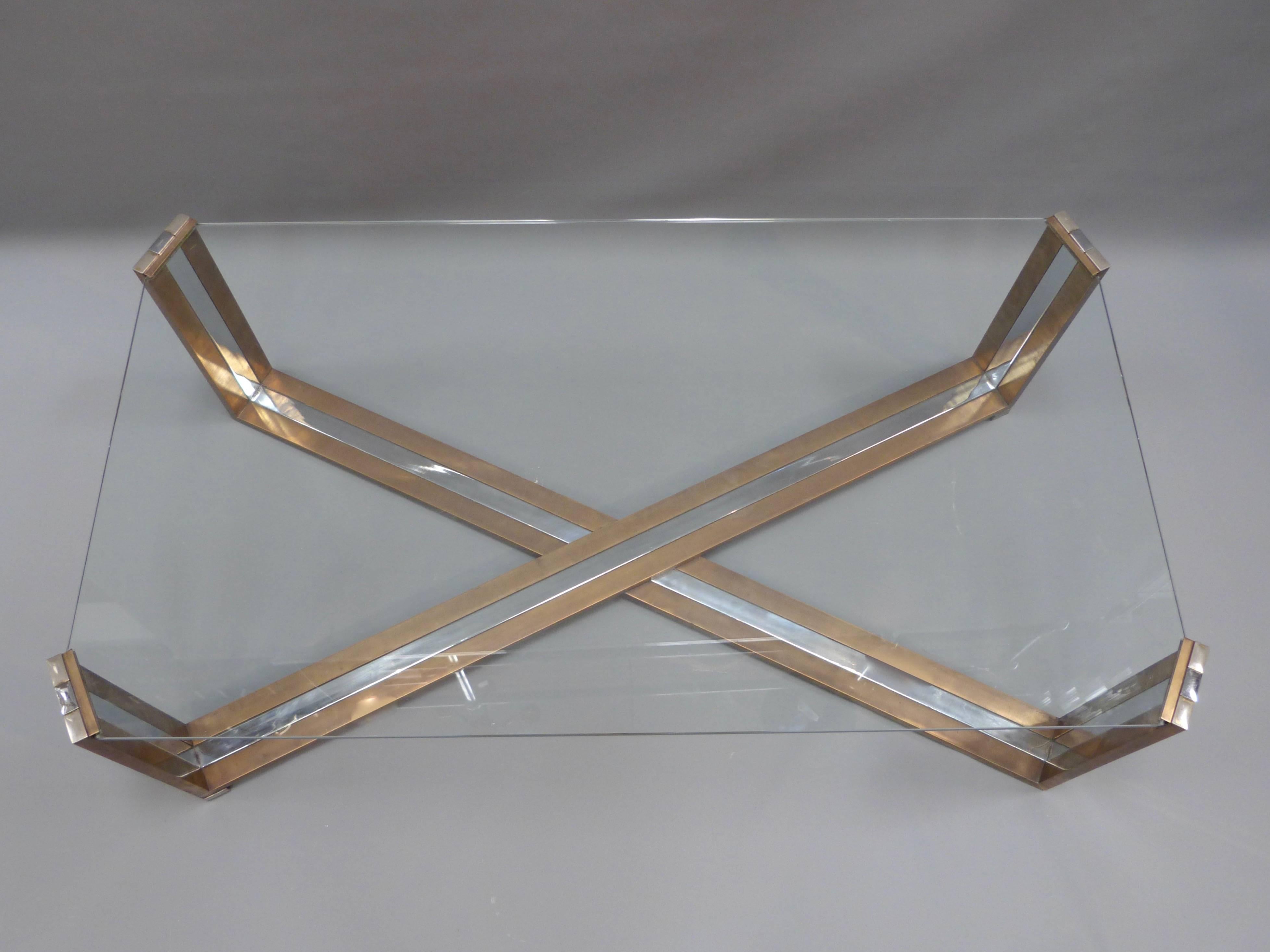 A very smart 1960s polished metal and brass coffee table by Romeo Rega.