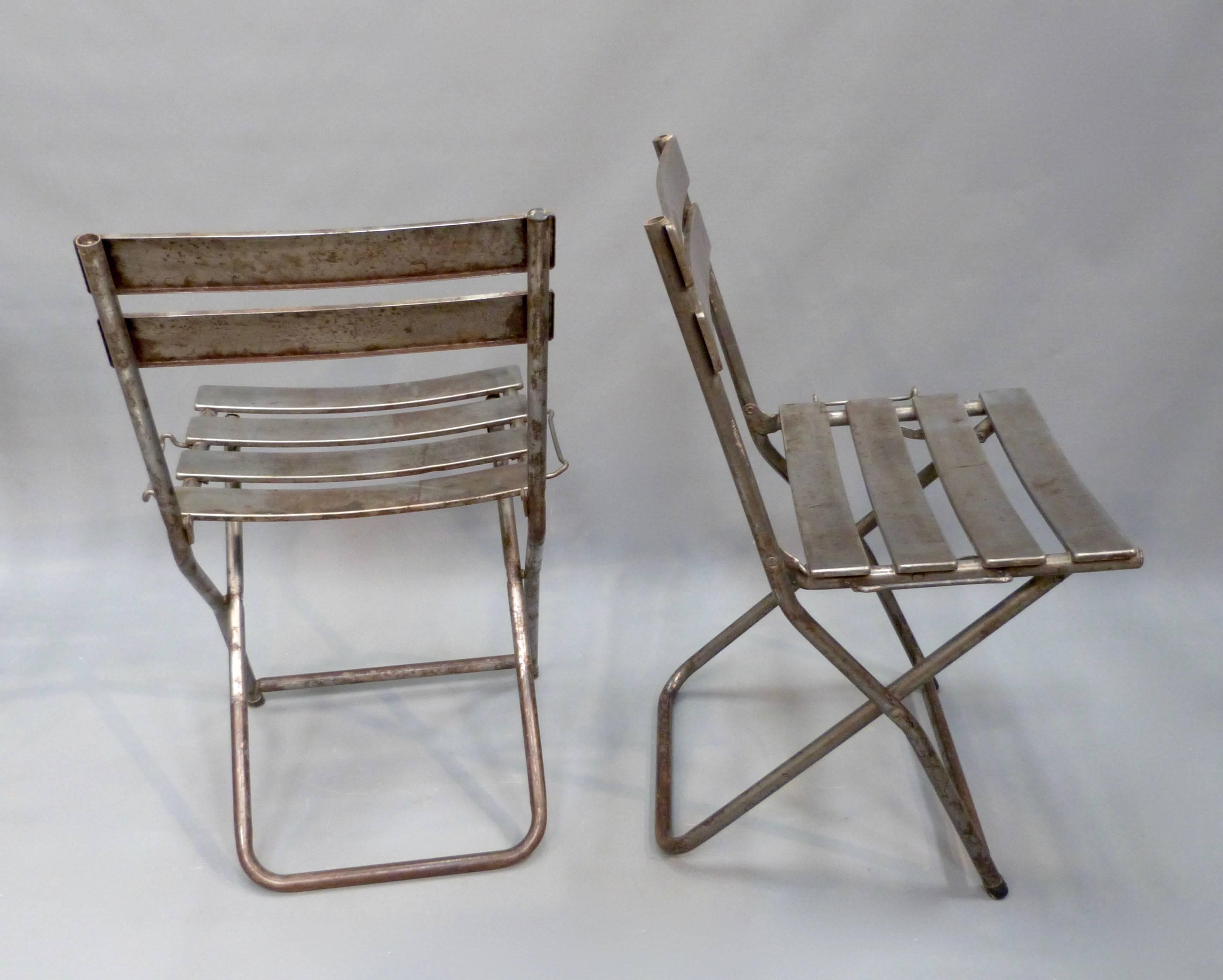 Mid-20th Century Set of Eight French Folding Steel Chairs For Sale