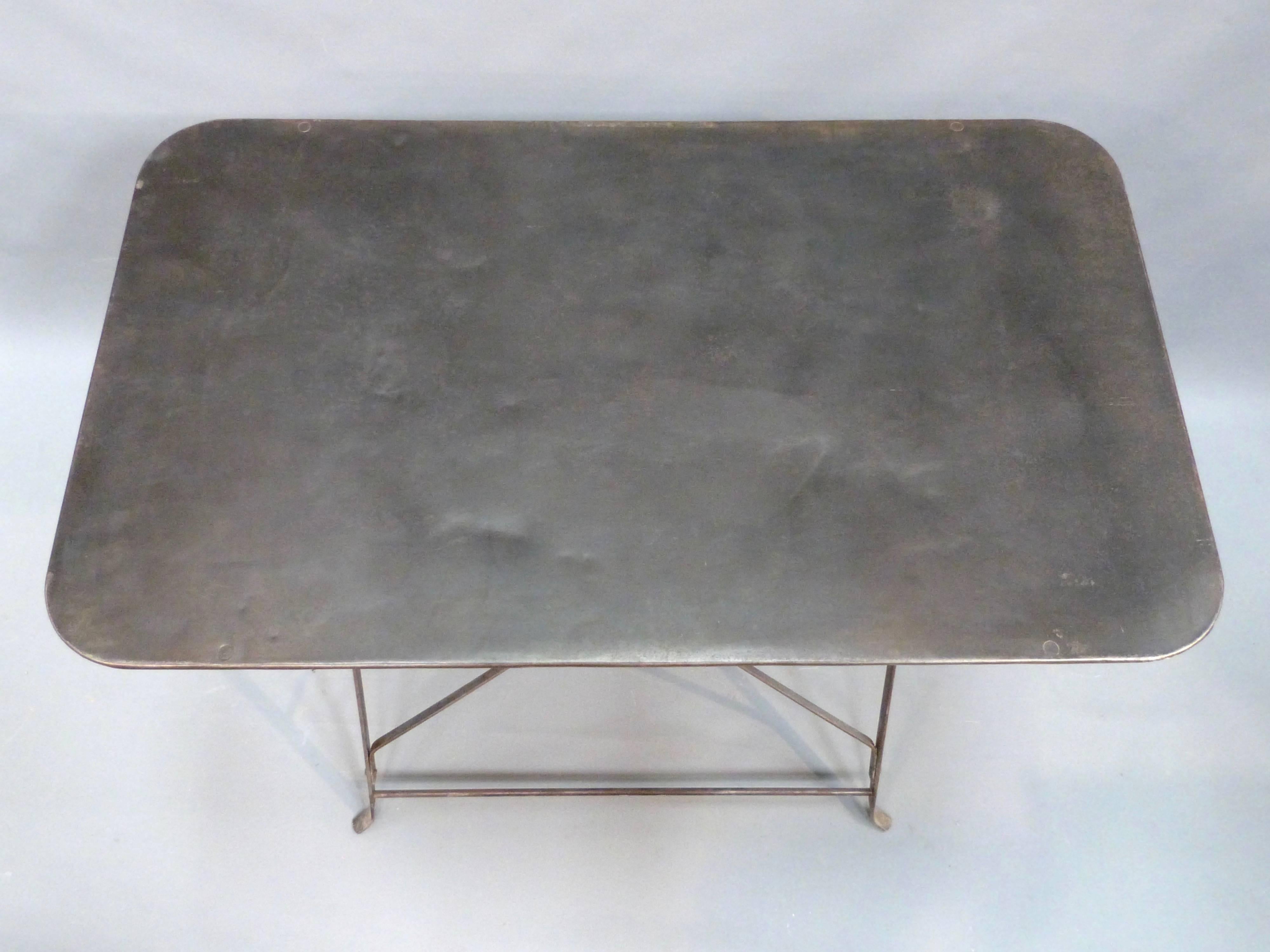 A French Industrial style steel folding table, circa 1930