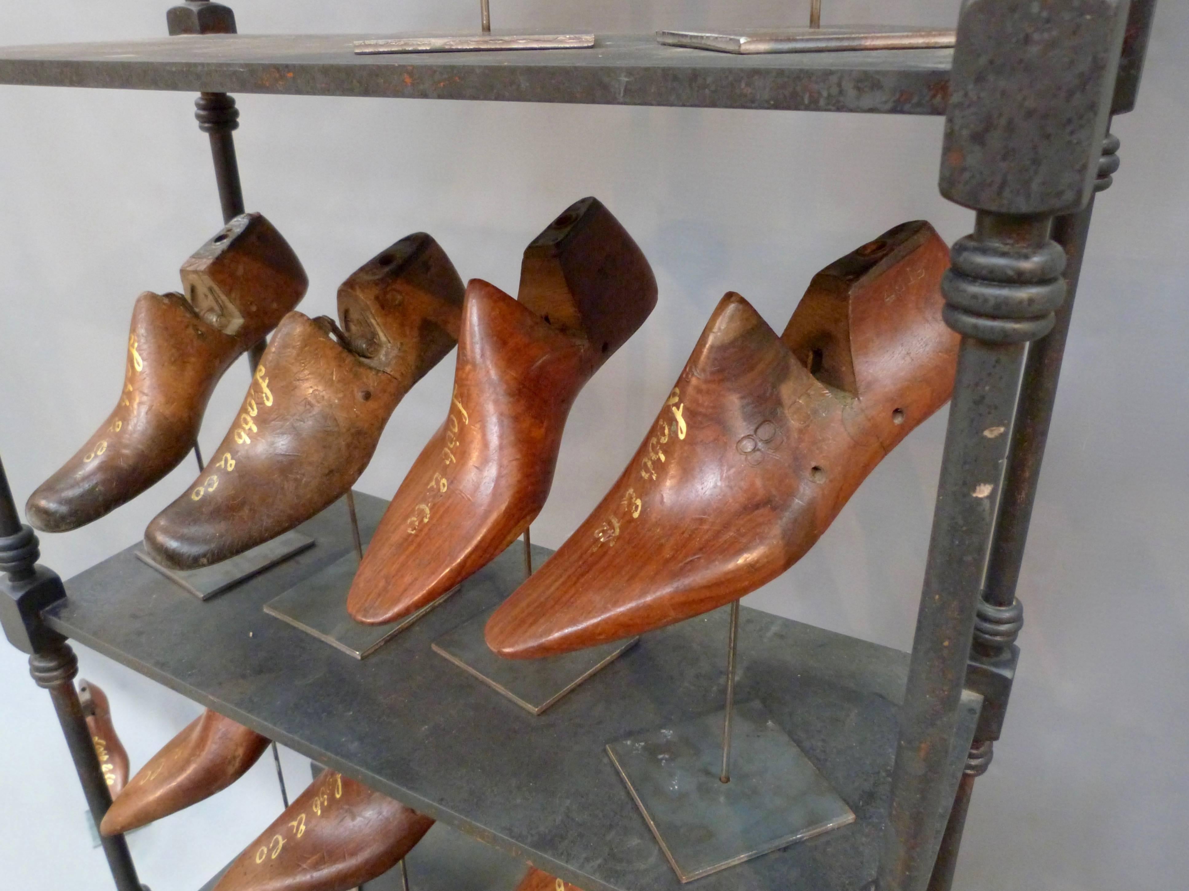 Victorian Collection of Lobb & Co. Shoe Moulds on a Stand For Sale