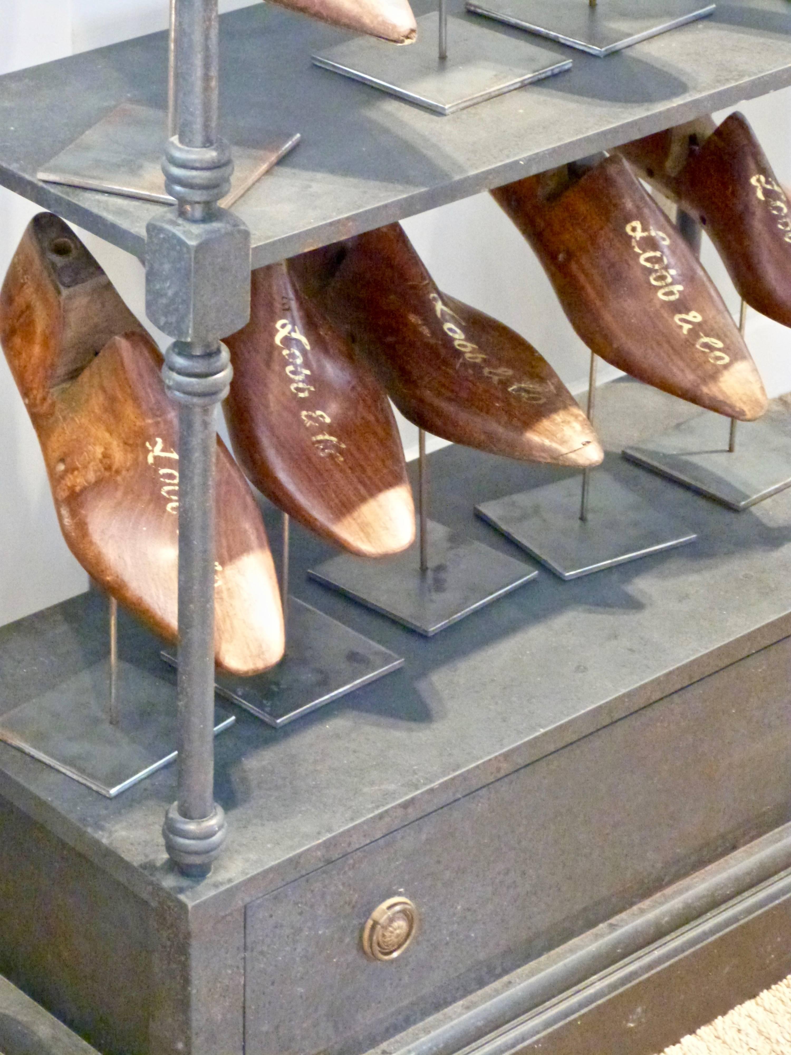 English Collection of Lobb & Co. Shoe Moulds on a Stand For Sale