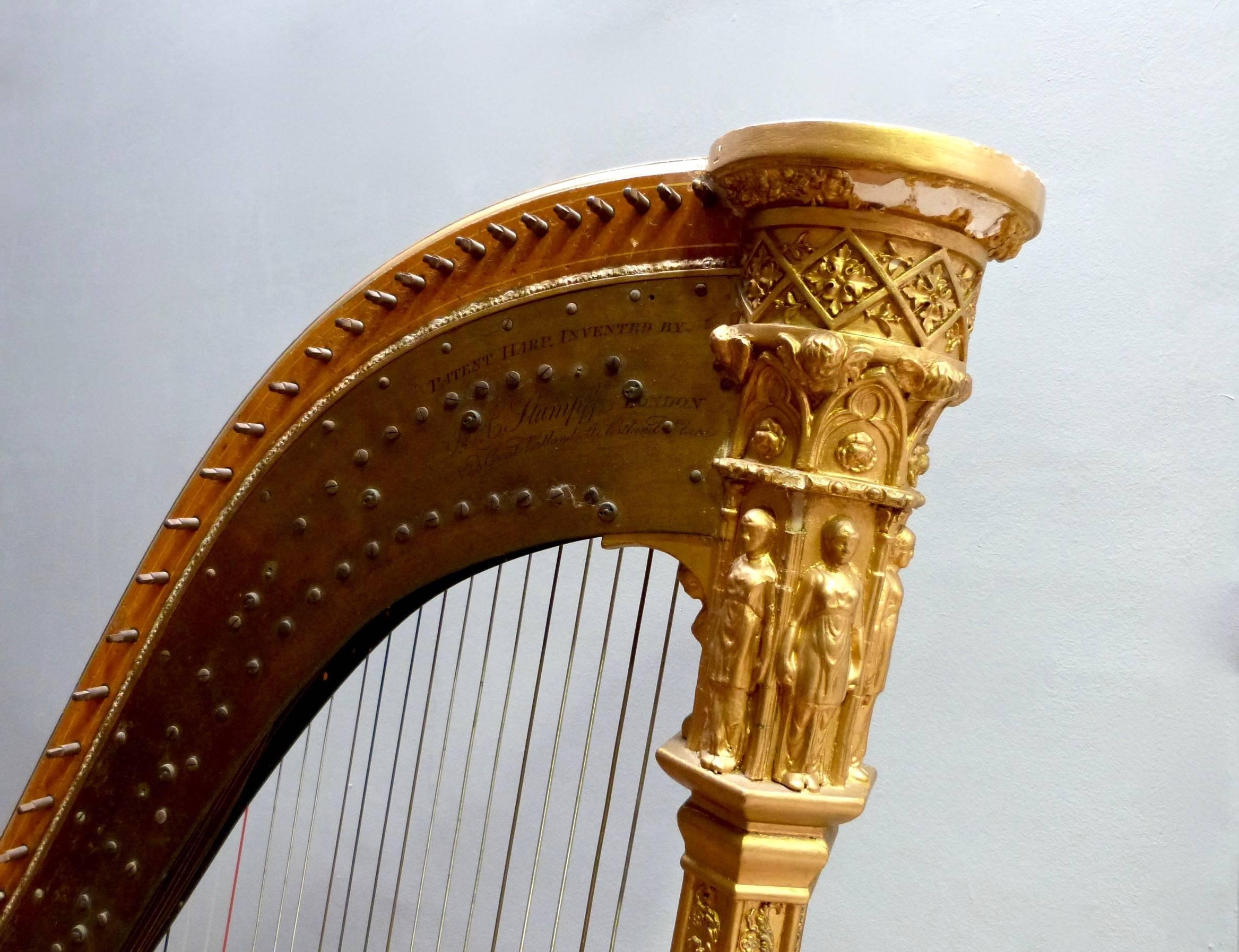 A most attractive Grecian Harp, circa 1860.

This enchanting instrument has a satin birch and giltwood frame of typical form but finished to a much higher standard than usual with a particularly attractive hexagonal column decorated with classical