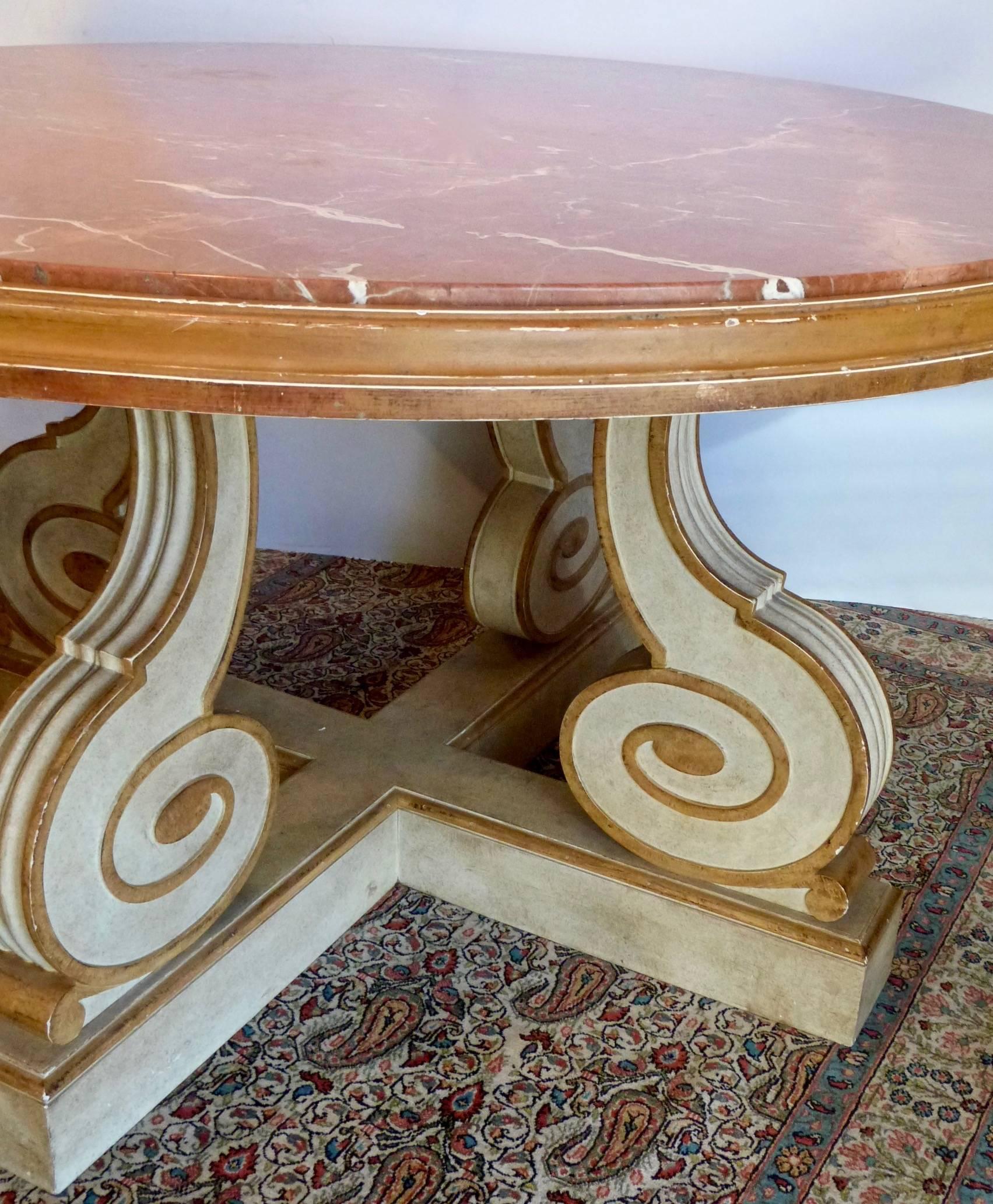 A very decorative mid-20th century painted centre table with a marble top.