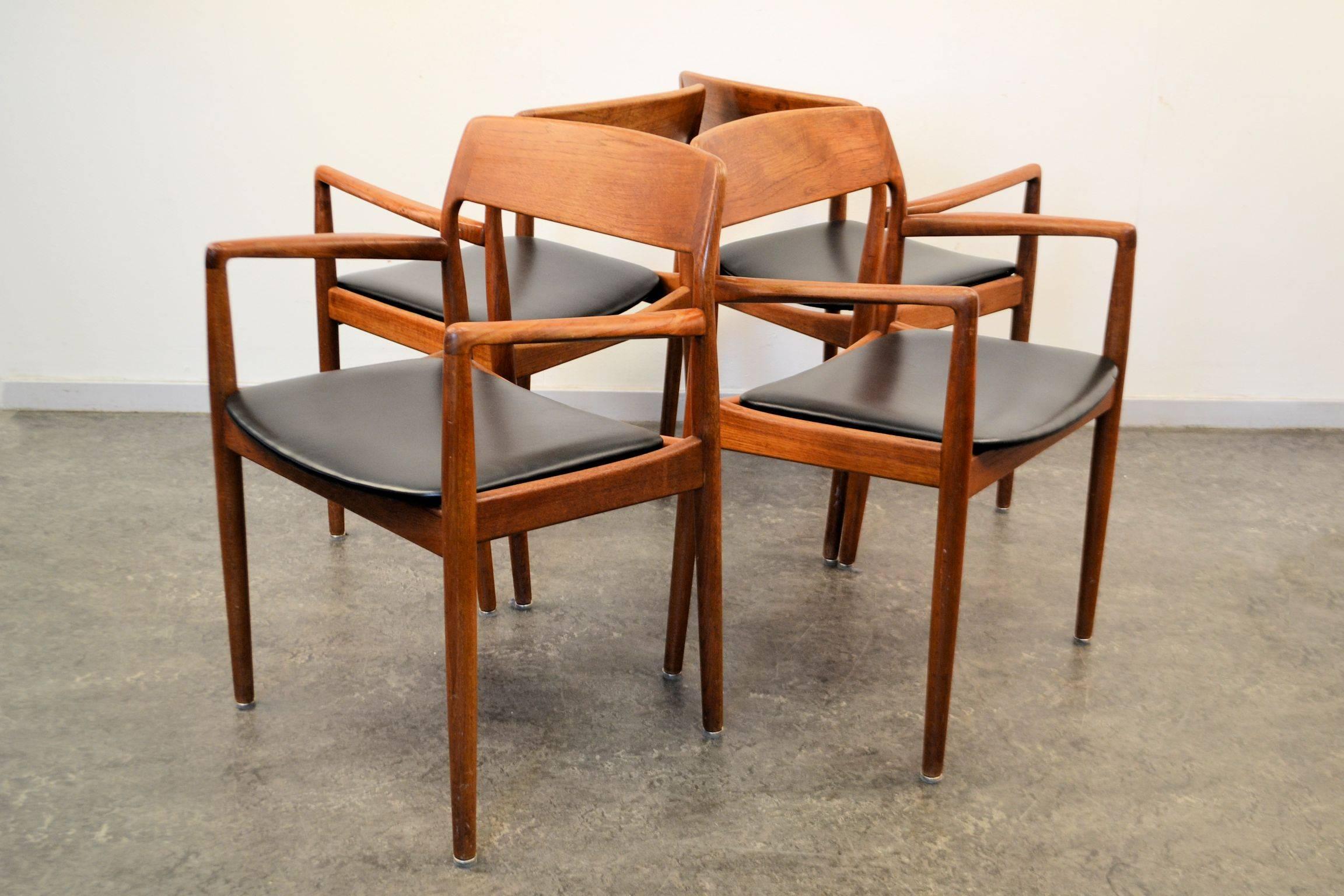Set of four Danish design teak chairs with massive teak armrests and backrests.
The chairs were manufactured in Denmark during the 1950s-1960s. These chairs could have been designed by Niels O. Møller.
Under each chair is a brand: 
