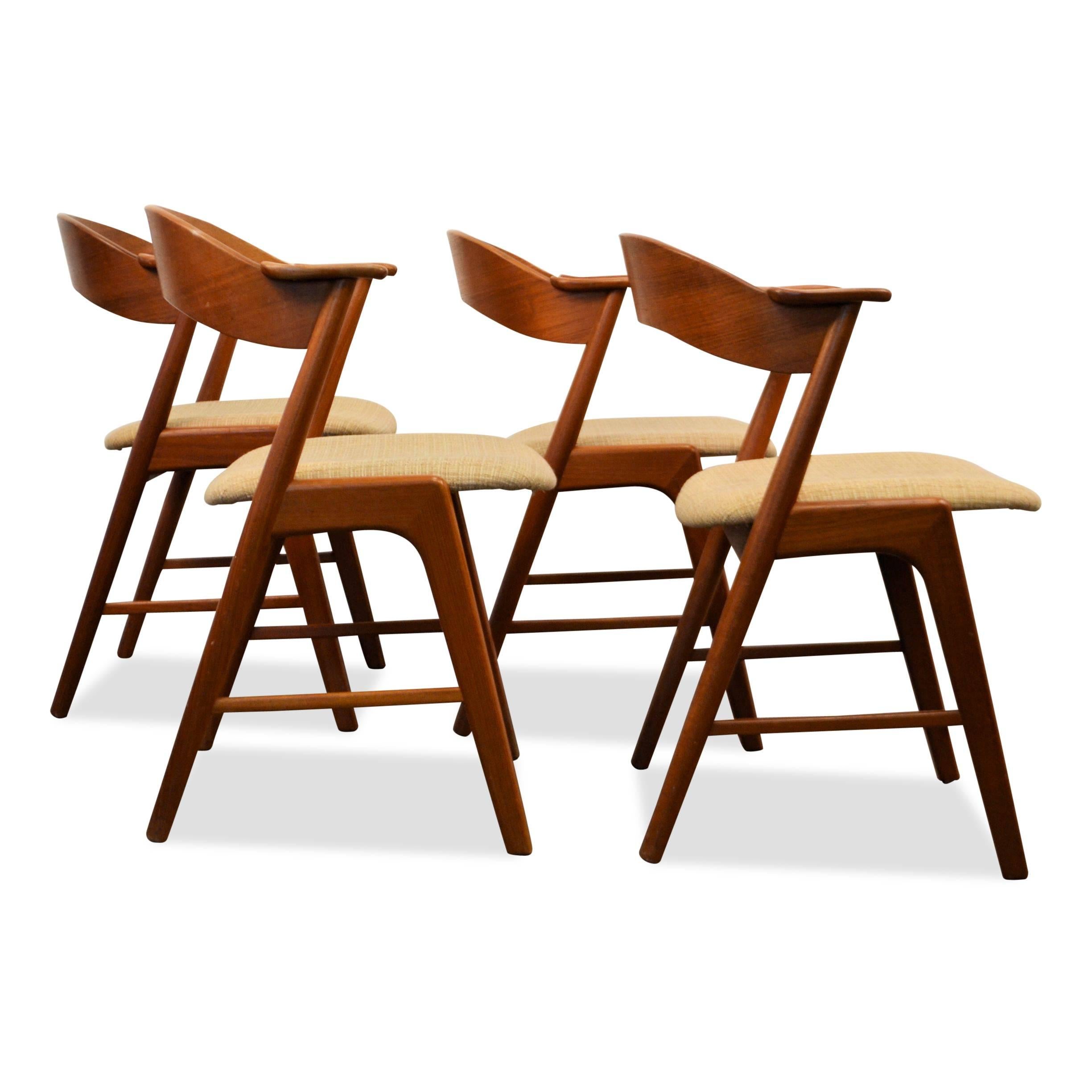 Gorgeous set of Danish modern teak dining chairs designed by Kai Kristiansen for Danish manufacturer K.S. Møbler. Kristiansen became worldwide known and celebrated for his iconic dining chair designs. These confortable chairs are no exception, the