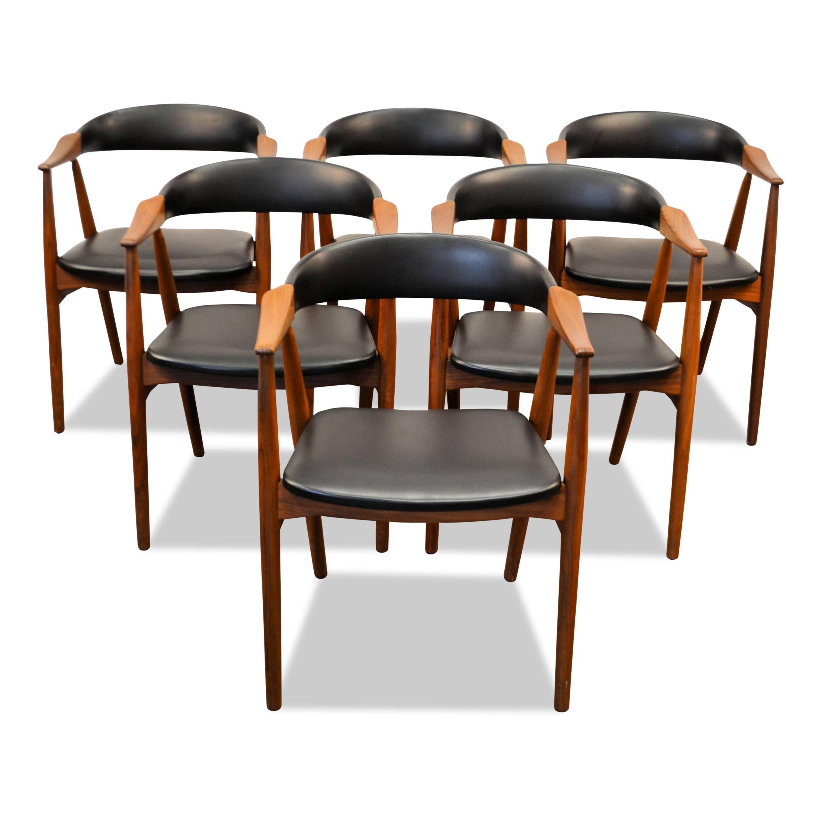 Set of six Danish Modern lounge chairs designed by Thomas Harlev and manufactured by top quality manufacturer Farstrup. Made out of beautiful teak wood, upholstered in black skai leather, featuring gorgeous curved backrests. This set breaths the