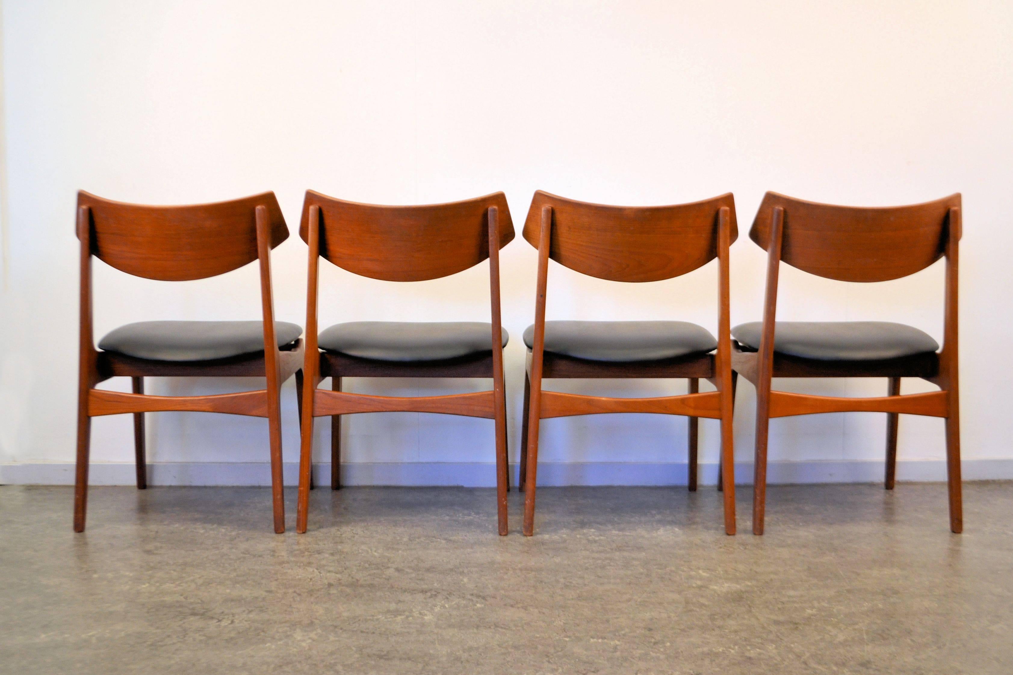 Set of four Danish Modern dining chairs designed and manufactured by Funder-Schmidt & Madsen, Denmark. Stylish curved backrests, new foam and skai leather upholstery. This stylish set fits right around your modern or vintage dining table.