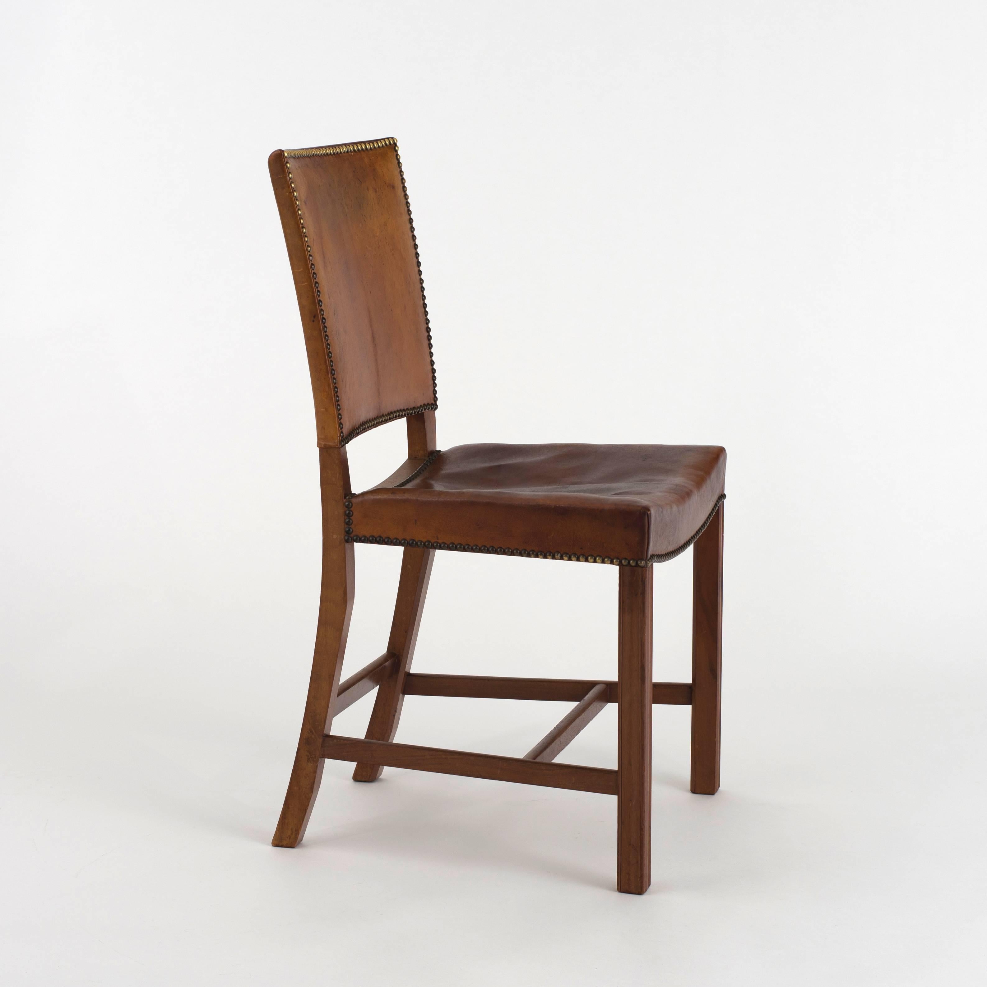 'Red Chair' in cuban mahogany, Niger leather and brass nails. 

Executed by Rud. Rasmussen 1927 - 1929.