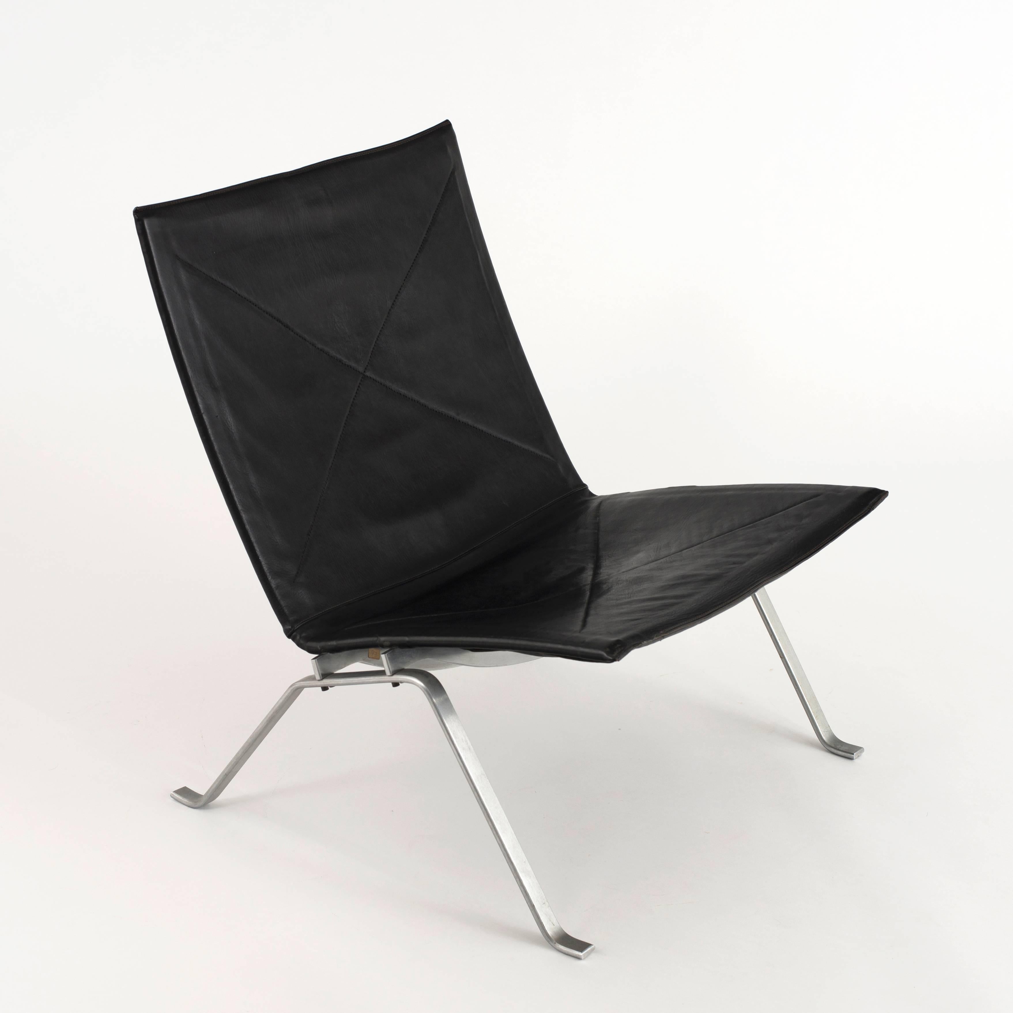 Poul Kjærholm model PK22, 1956. Executed by E. Kold Christensen, Denmark. 

Dull chromium-plated steel and original black leather.

Two chairs available.