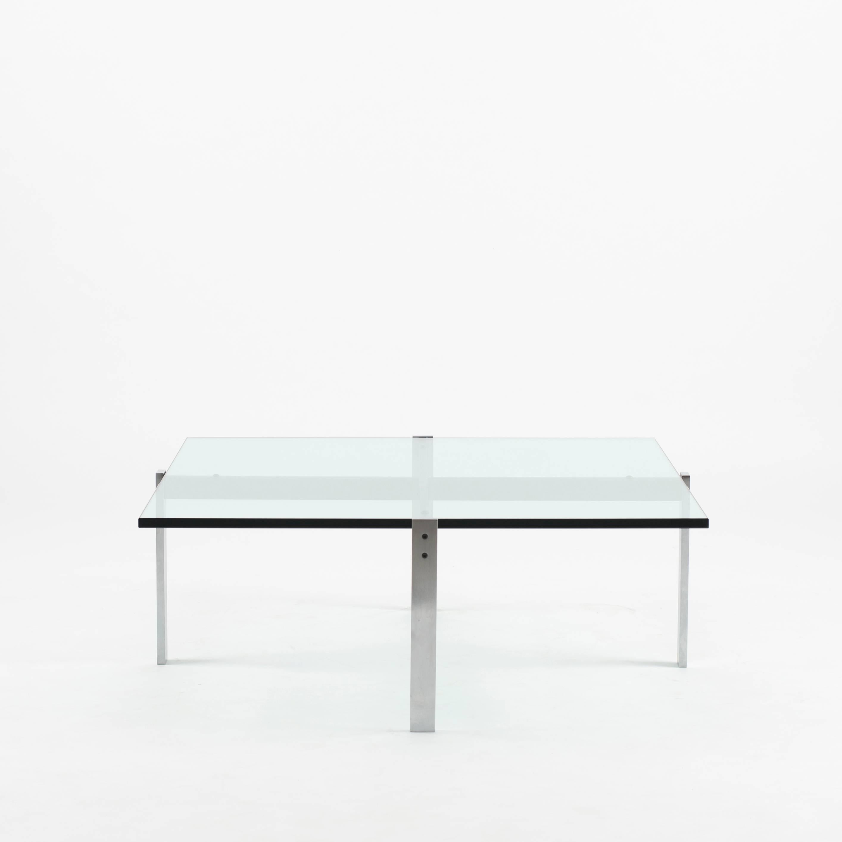 Poul Kjaerholm PK65 coffee table, 1979. Executed by E. Kold Christensen.

Dull chromium-plated steel and glass top. 

Literature: Michael Sheridan, The Funiture of Poul Kjærholm: Catalogue Raisonné, 2007. p. 202 - 204.