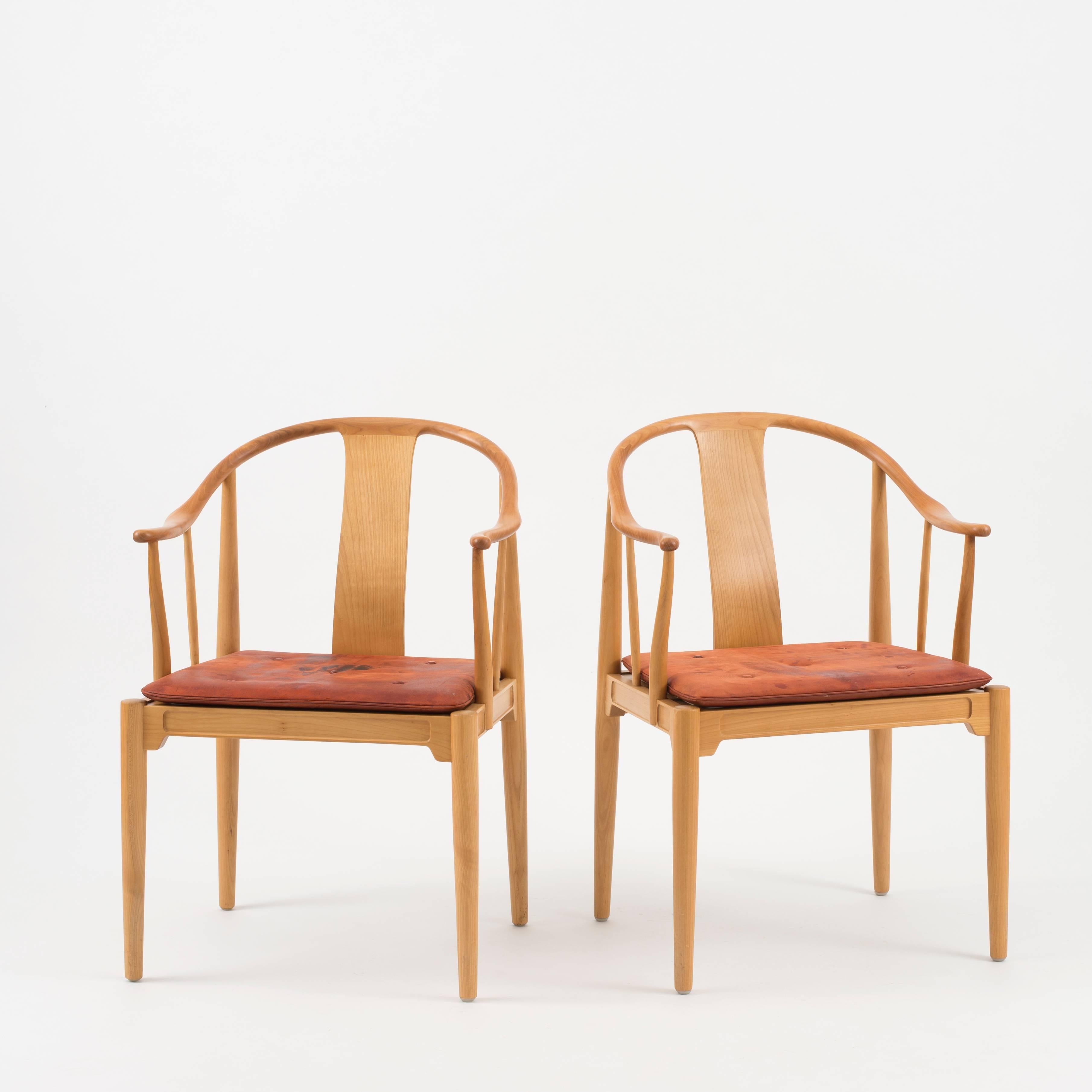 A pair of Hans J. Wegner China chairs in cherrywood. Executed by Fritz Hansen, 1968.