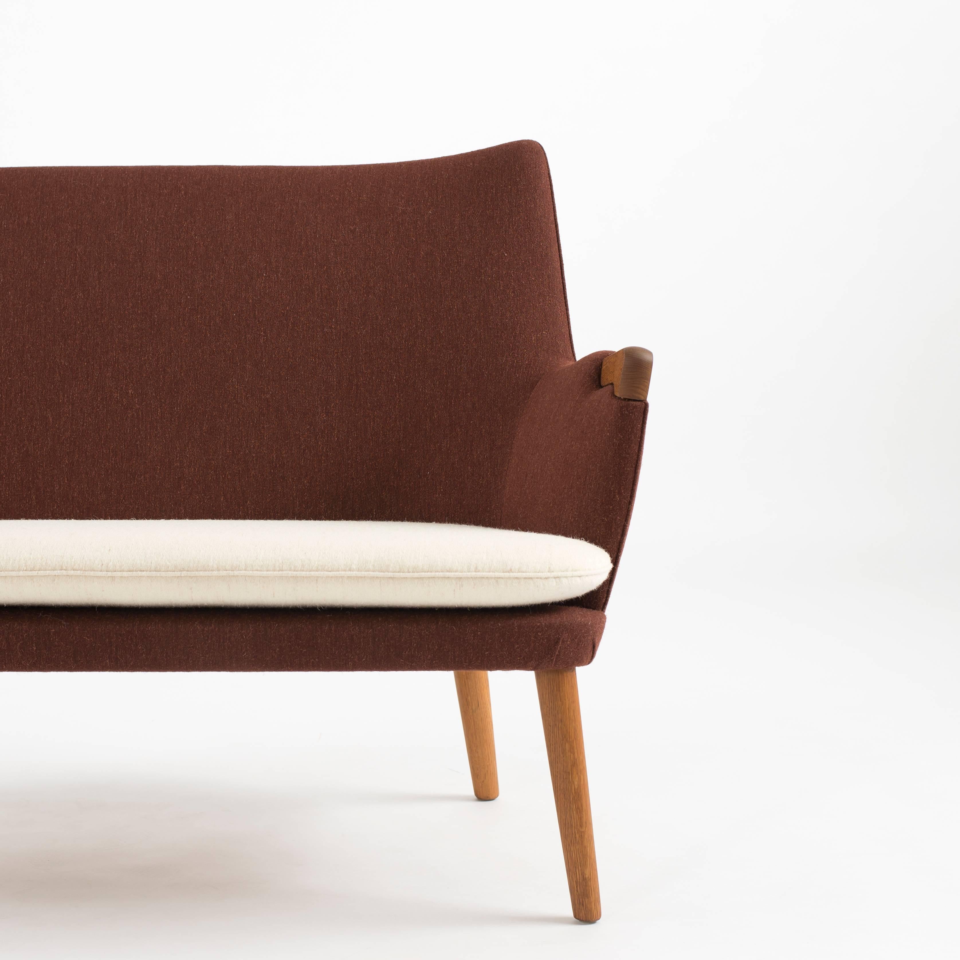 Scandinavian Modern Hans J. Wegner Two-Seat Sofa in Oak and Fabric for AP Stolen For Sale