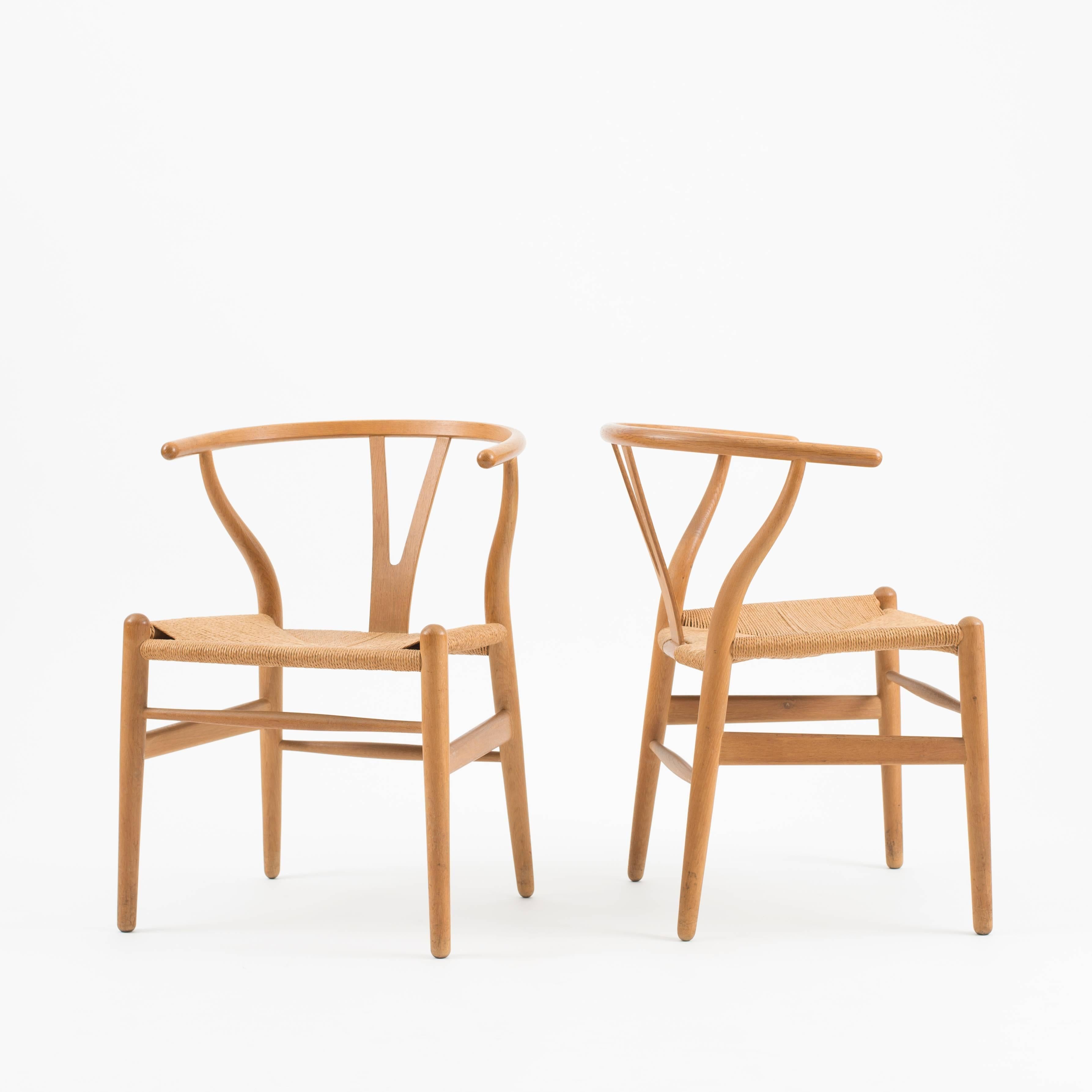 A set of four Wishbone chairs by Hans J. Wegner. Executed by Carl Hansen, Denmark.

