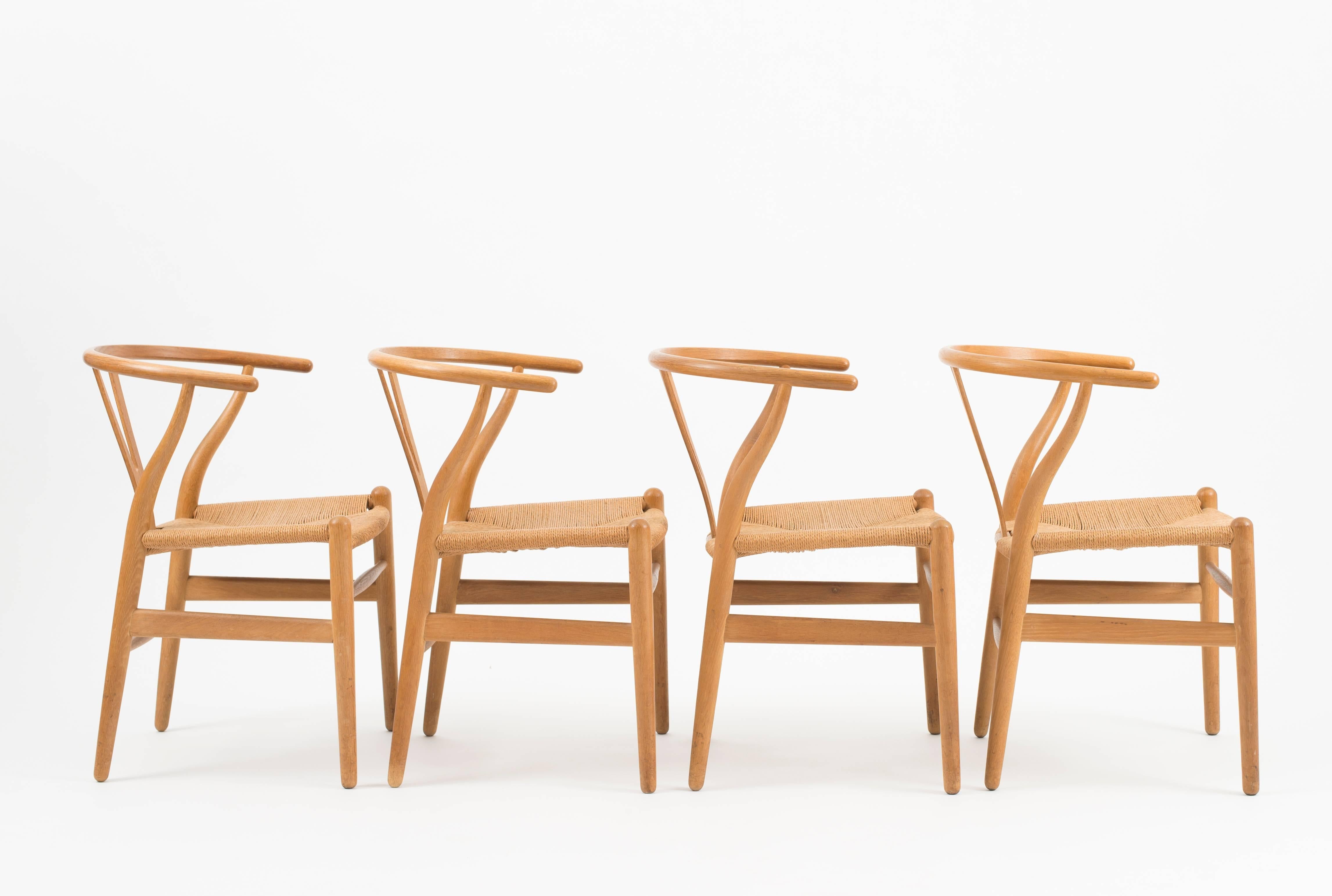 Scandinavian Modern Hans J. Wegner Set of Four Wishbone Chairs in Oak for Carl Hansen