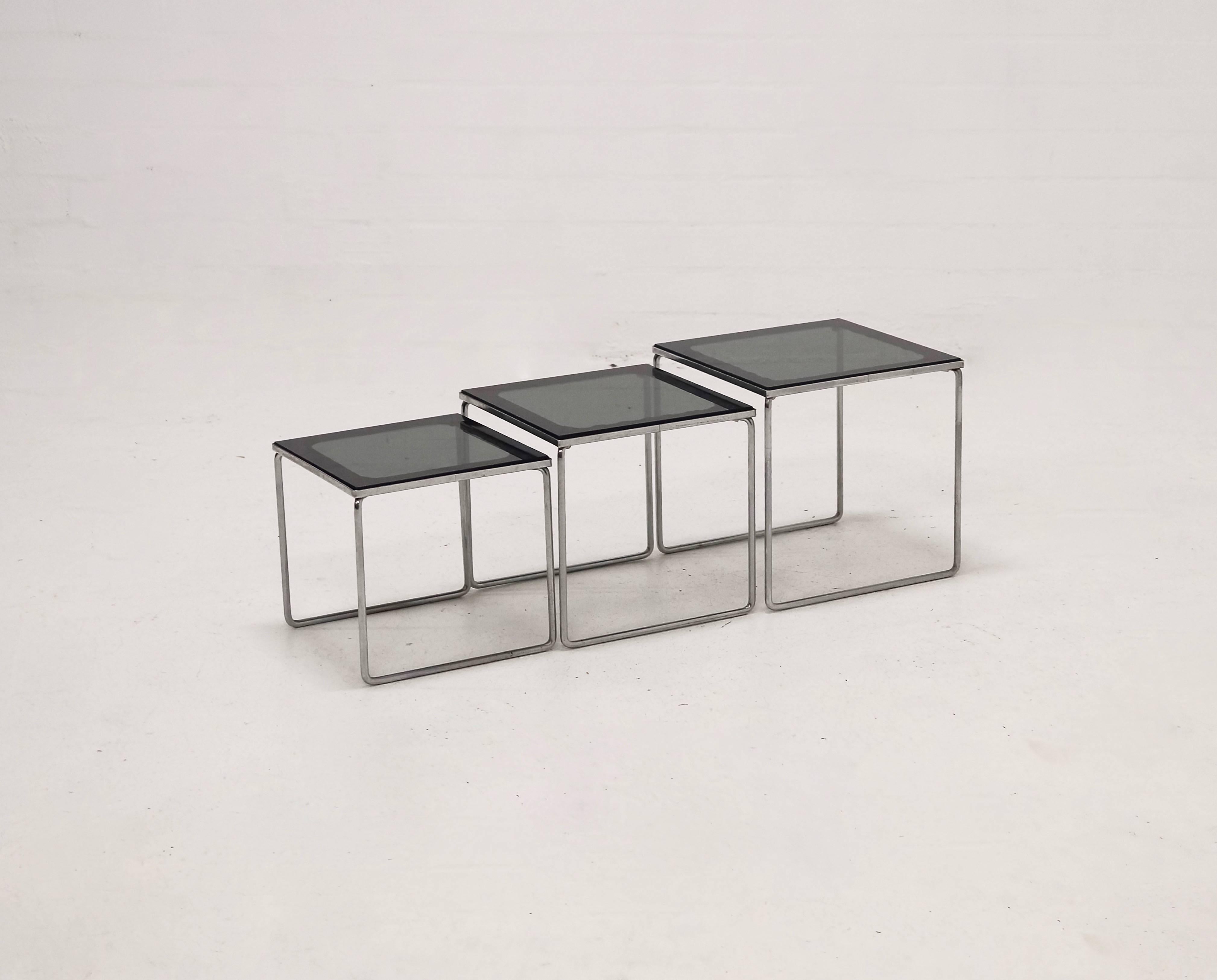 Set of 1960s heavy chrome-plated nesting tables in style Milo Baughman.