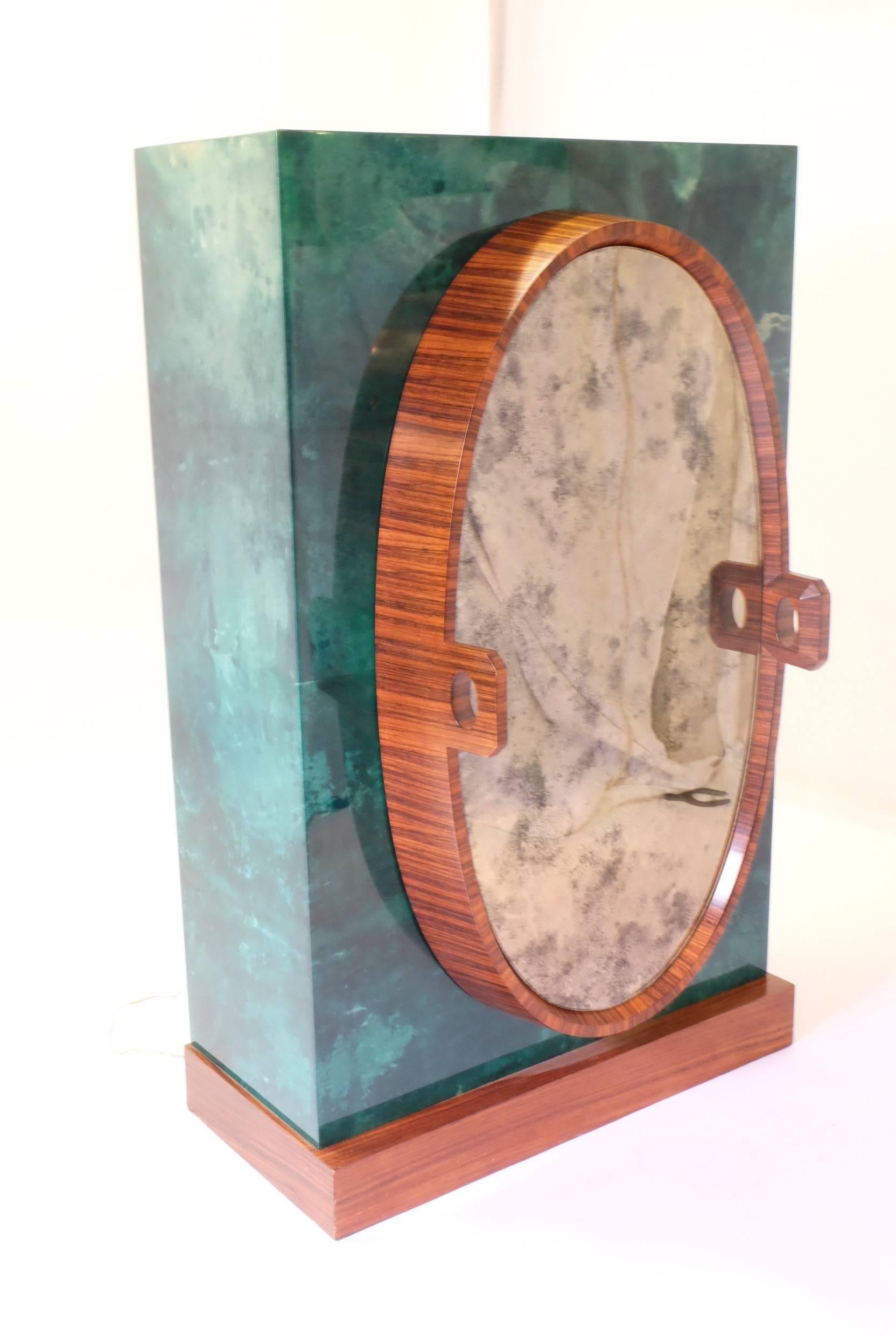 A rare bar by Aldo Tura in green goatskin in good condition.
