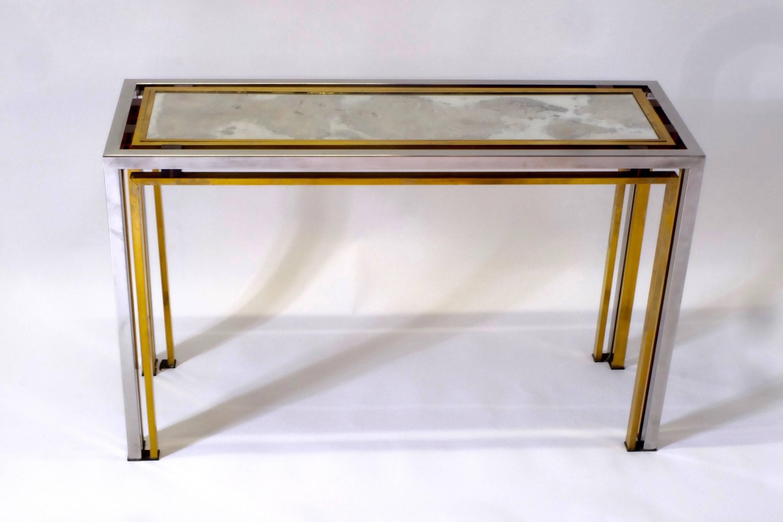 Console by Romeo Rega, Italy, 1970, with oxide mirror, the coffee table from the same collection is also available.