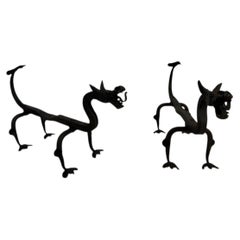 Pair of Andiron in Wrought Iron mod "Dragon" 1940's