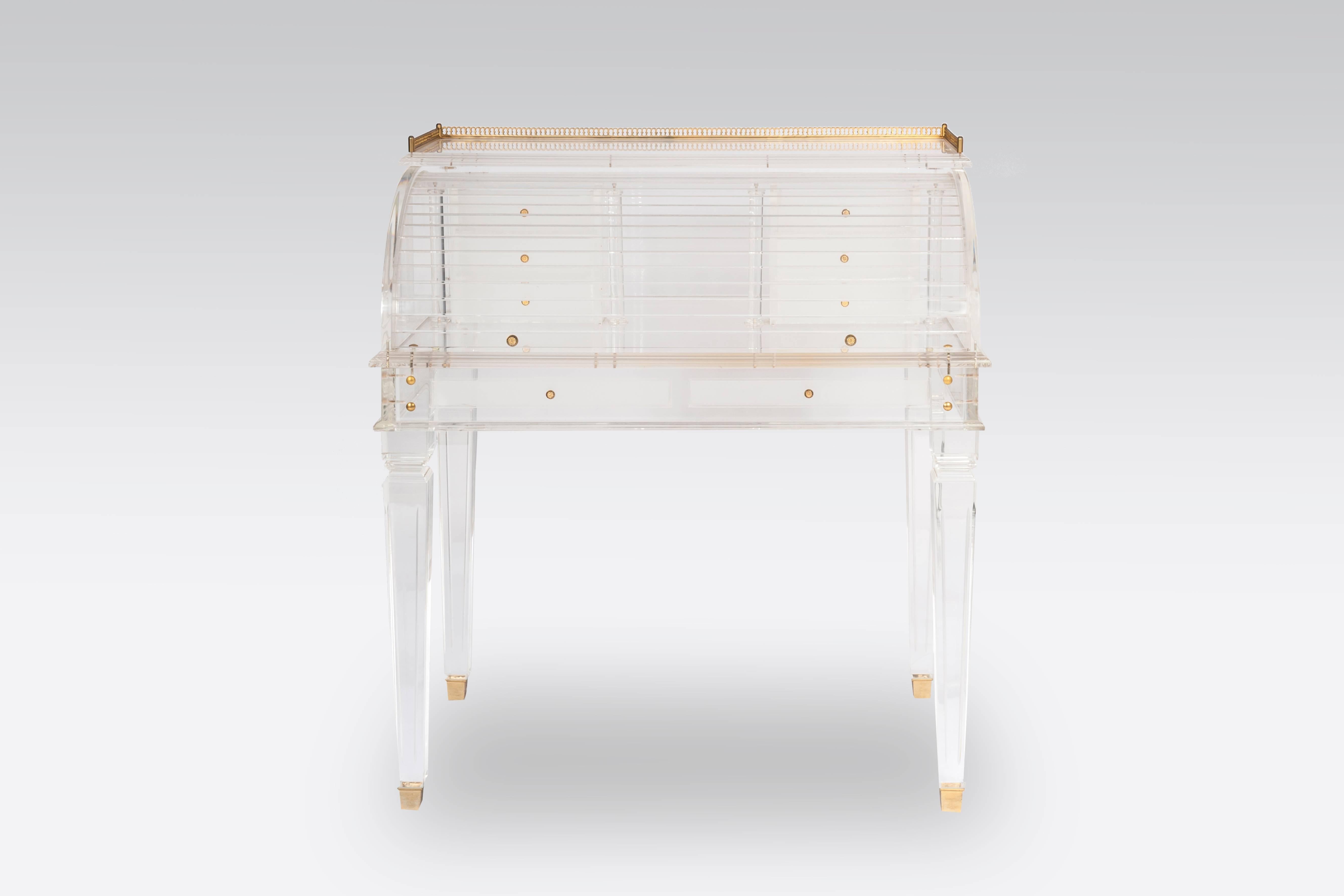 Amazing very rare limited edition cylinder secretary desk in Lucite late 1980s
This is the best secretary kept in town: A fine art, exquisite piece of furniture offered in mint condition. It is pretty unbelievable to look inside this original