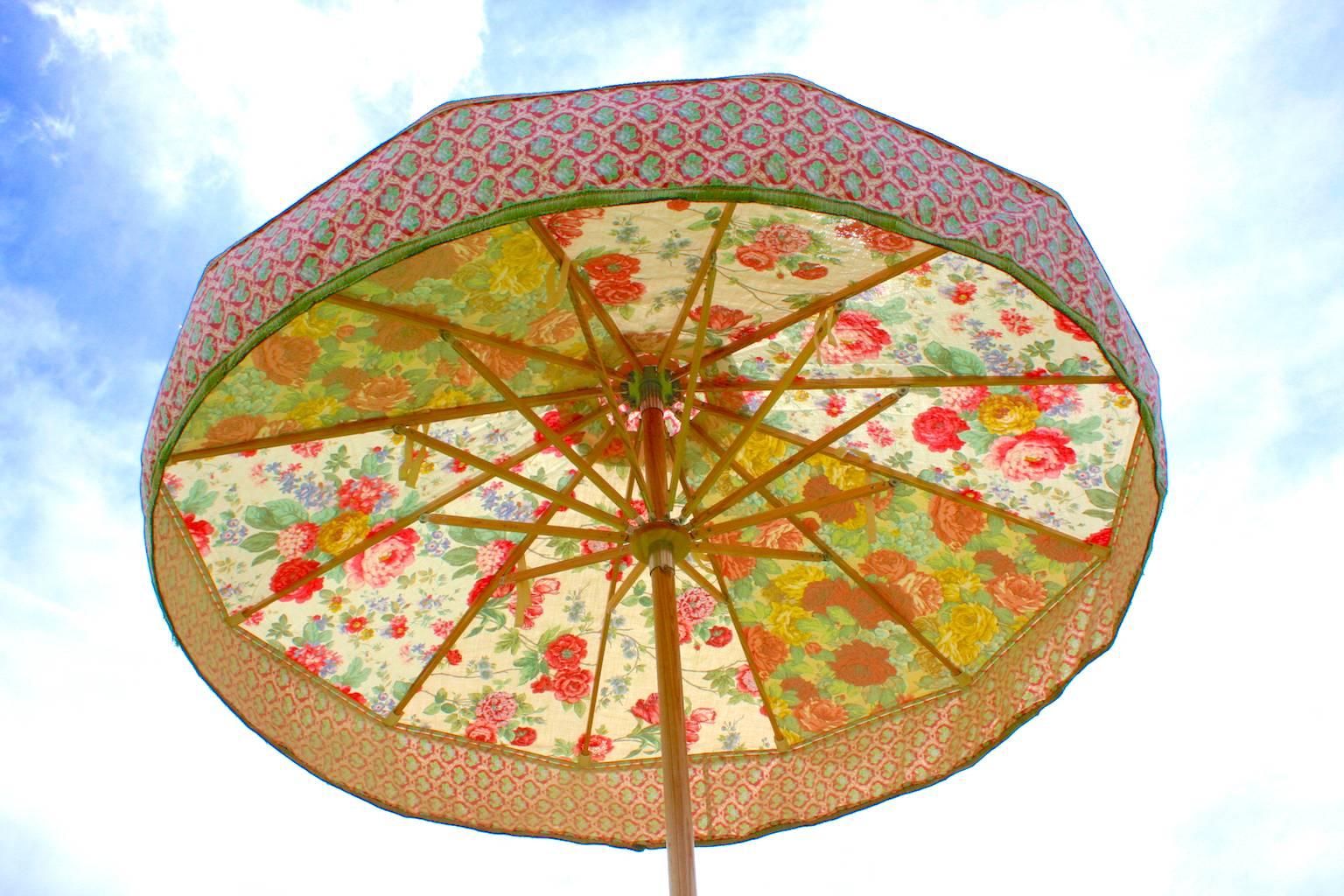 Sunbeam Jackie's iconic contemporary parasols are unique one-off pieces, each parasol is made using it's own selection of heritage textiles. Displayed on Sunbeam Jackie's specially-crafted ash parasol frame, these parasols are objects of