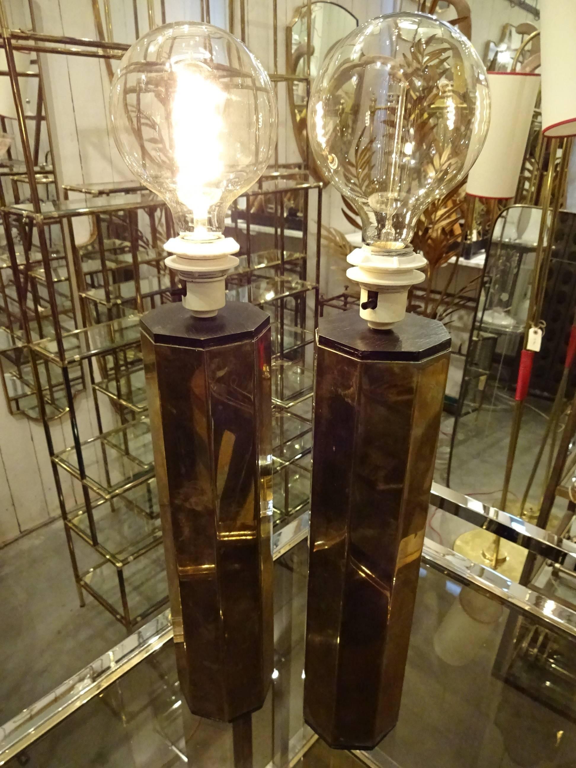 Wonderful and very rare pair of vintage octagonal brass table lamps. Designed by Swedish Hans-Agne Jakobsson, Markaryd Sweden. Model no. B203/36, circa 1960s. The bases and tops are in dark stained wood. In super vintage condition with only small