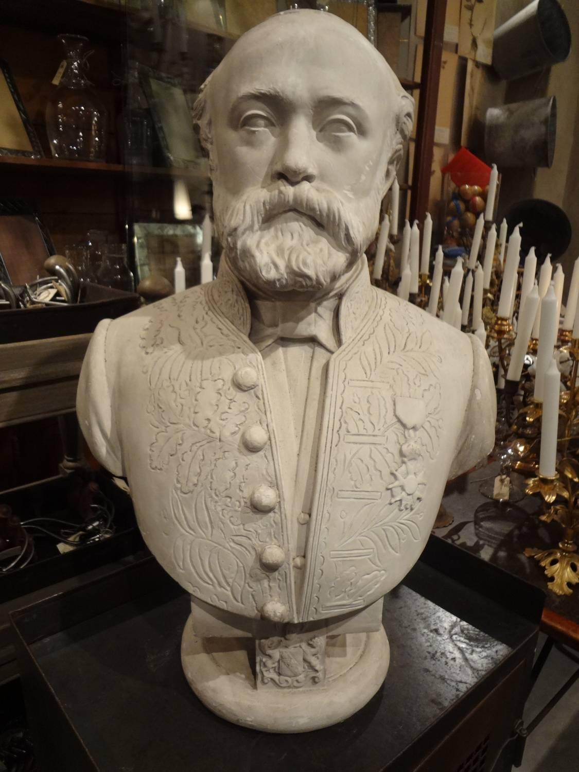 Large plaster bust of a French statesman. Lovely details such as medals and coats of arms.

Dated on the back with the year 1862.