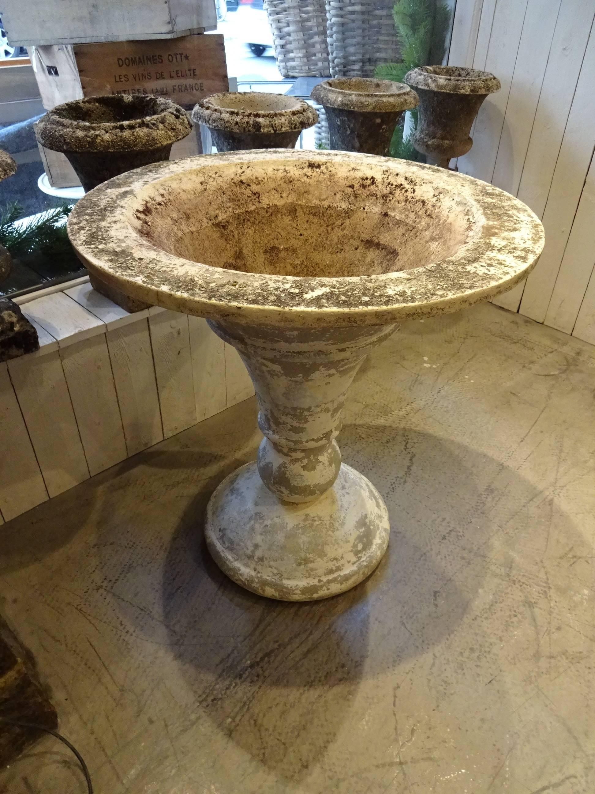 Tall and elegant old jardiniere or garden pot from the garden of a French chateau. Extremely well preserved condition, yet with the most beautiful weathered patina from the elements.
We currently have a pair of this type in stock. The quoted price