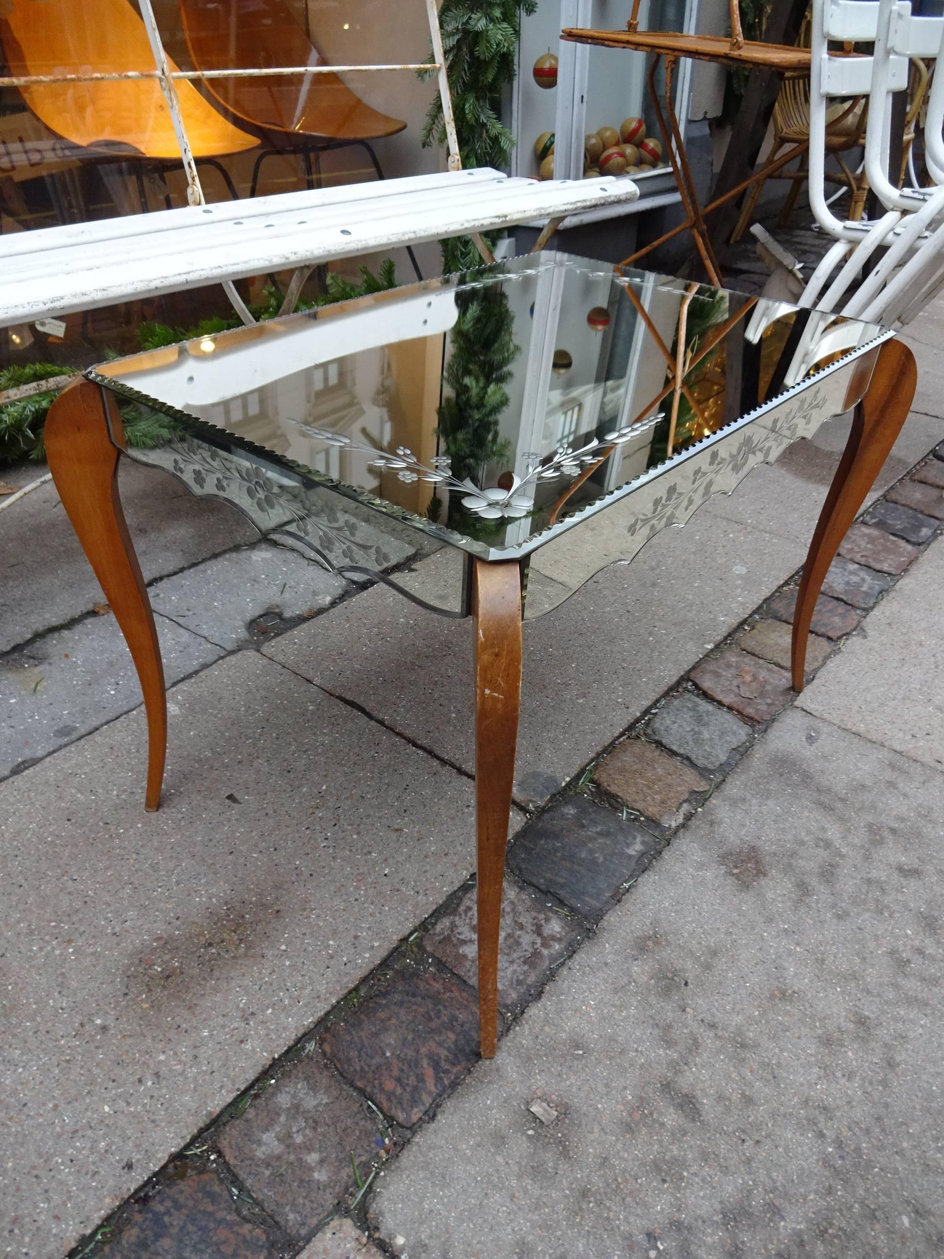 Lovely vintage French mirrored table, with super etched detailing and elegant legs. From the 1950s. Would be fantastic as a coffee table, side table or bedside table.