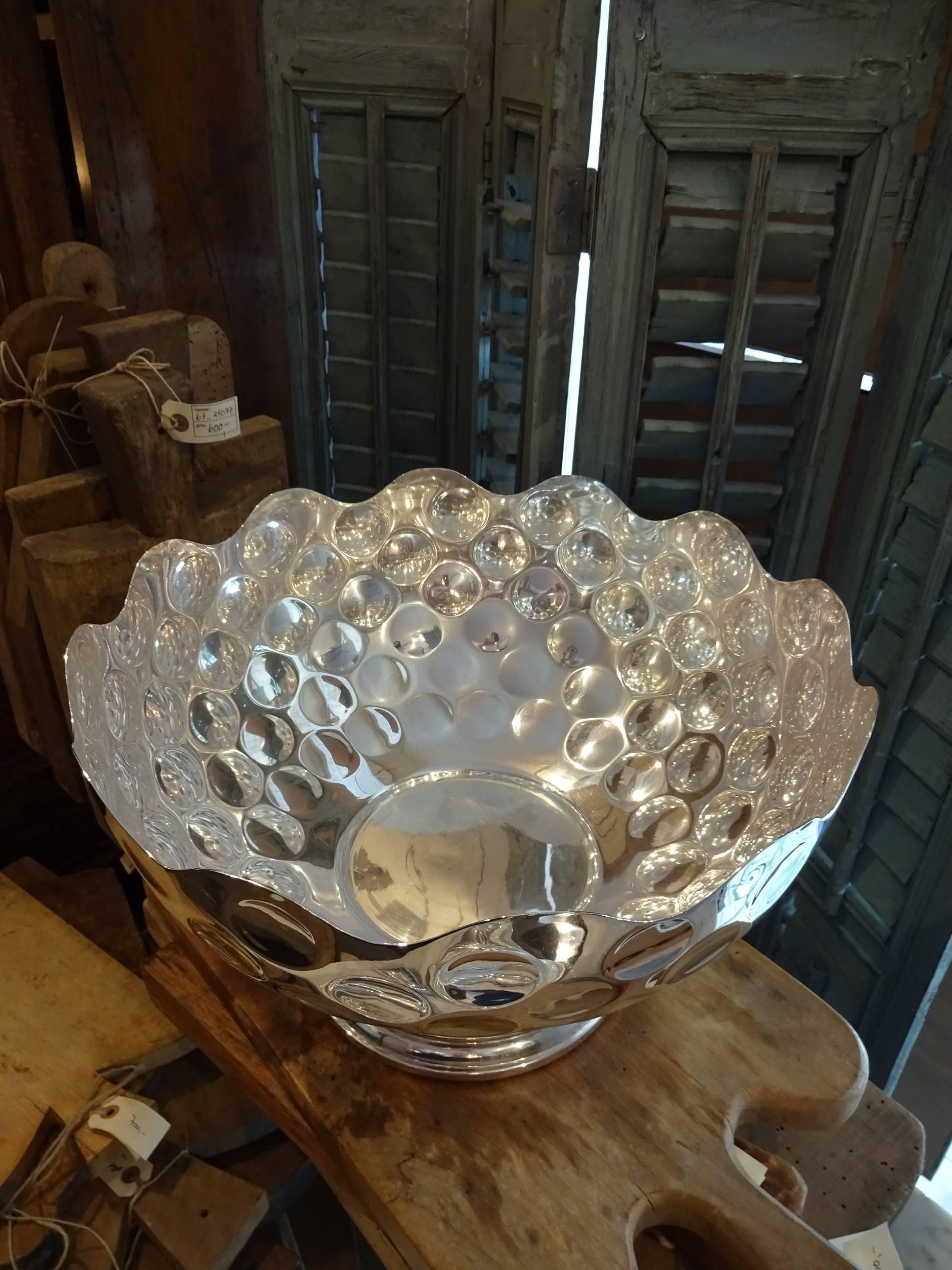 Very elegant silver plated champagne cooler, from France. Designed to represented half a golf ball, the cooler comes from an old and distinguished golf club in the South of France. Could quite easily accommodate a couple of magnum bottles or