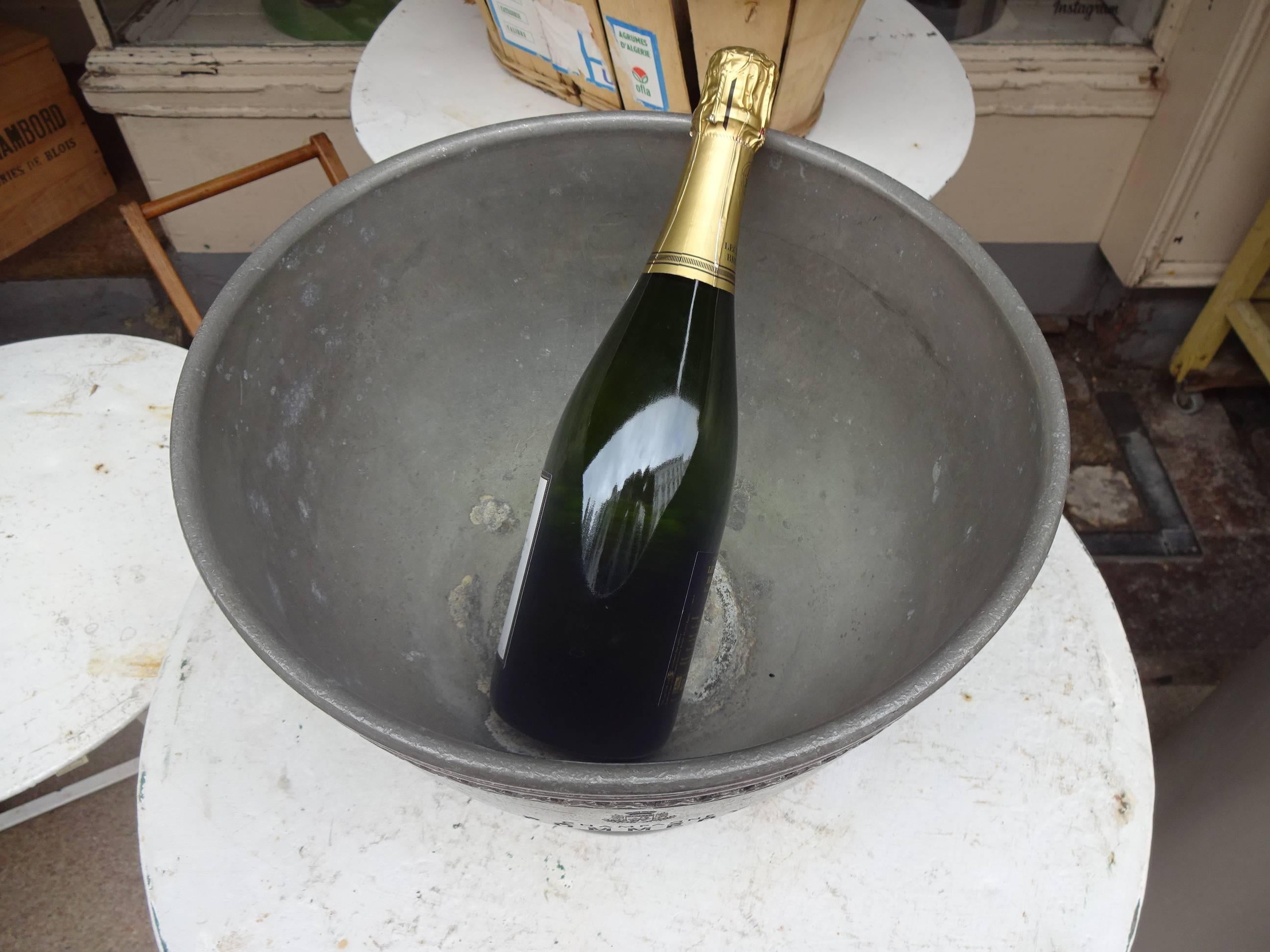 Super beautiful and very rare vintage French champagne cooler from the champagne house Pommery in Reims. This piece is made of tin and is ornamented with a decorative Gothic border.

 