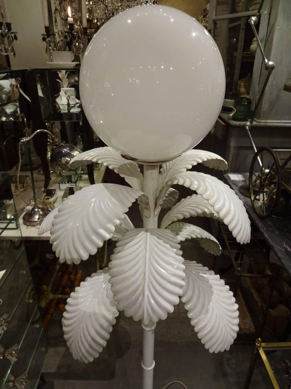 Fabulous vintage white French floor lamp, shaped as a palm, with a charming globe white opaque glass shade. Super piece.