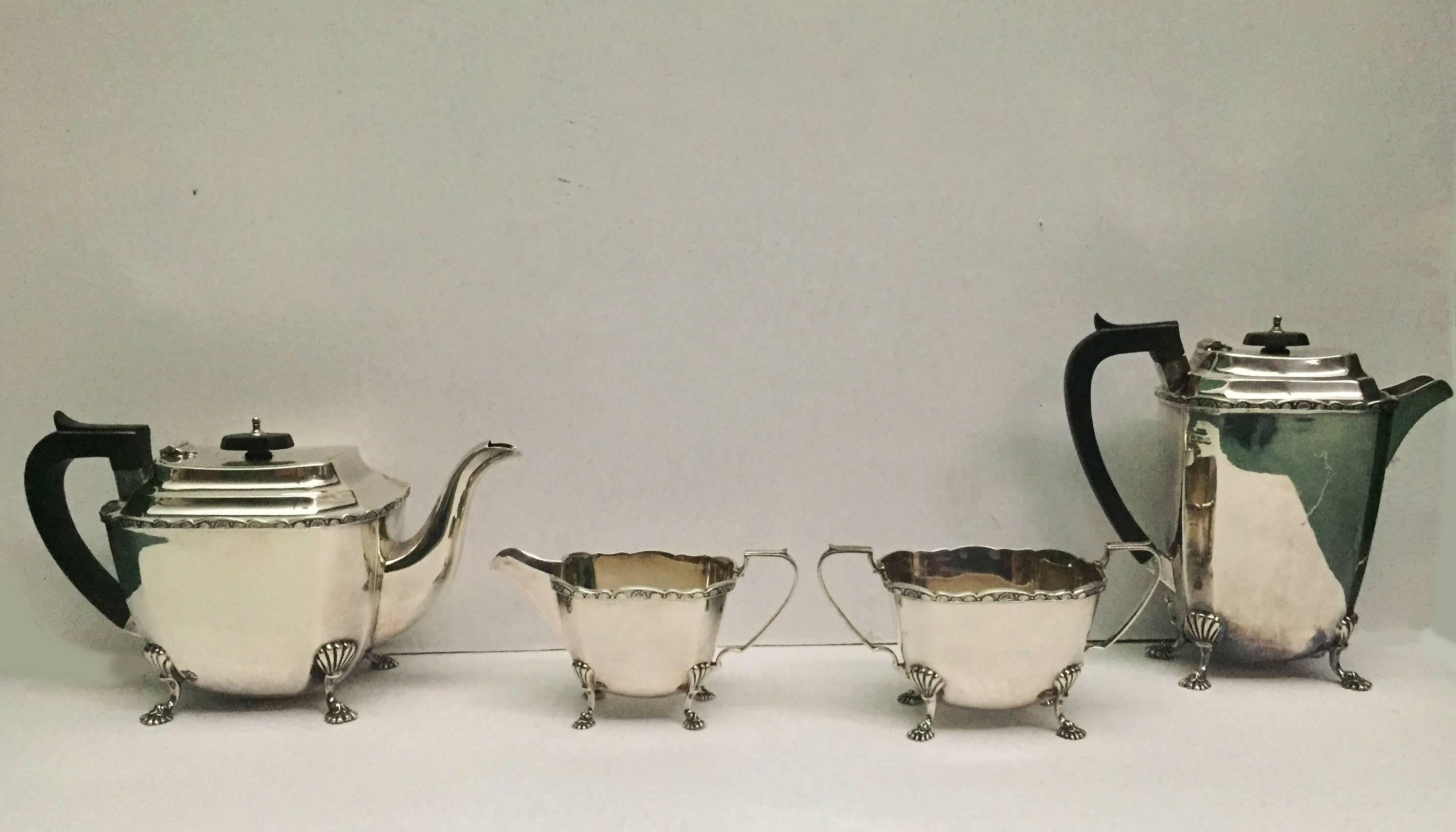 Four-piece set includes: teapot, water jug, sugar and cream.

please note: silver tray is not included in this sale. This can be bought separately for £4,500. 

Silver tray information(NOT INCLUDED):

A fine large solid silver Art Deco tray made by