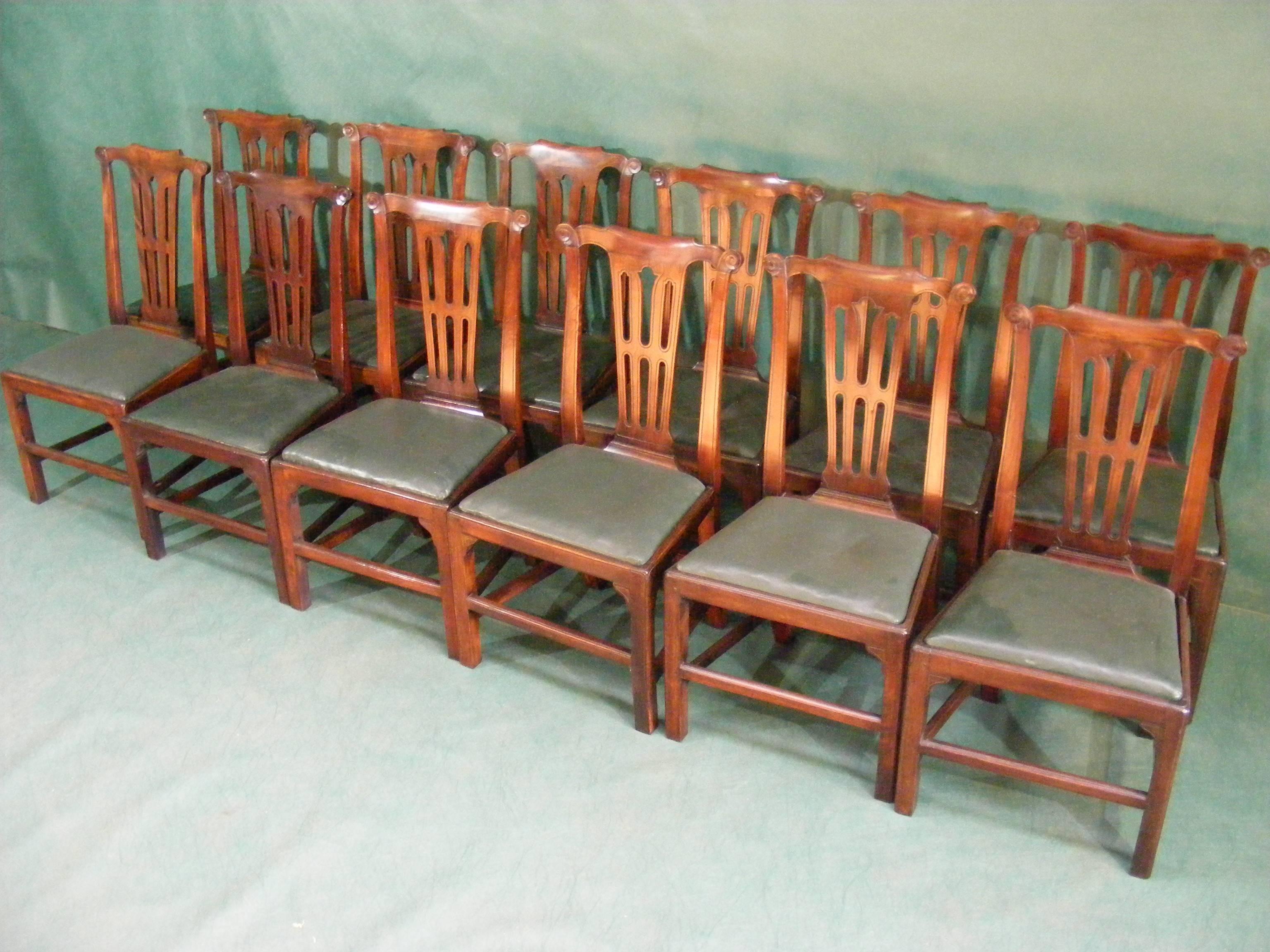 A grand set of 12 Scottish provincial mahogany dining chairs with the original drop in leather seats (requiring re-stuffing) 
 Drop in seats resting on 4 square legs united by stretchers. Very much of the 18th and 19th century period.

Measures: