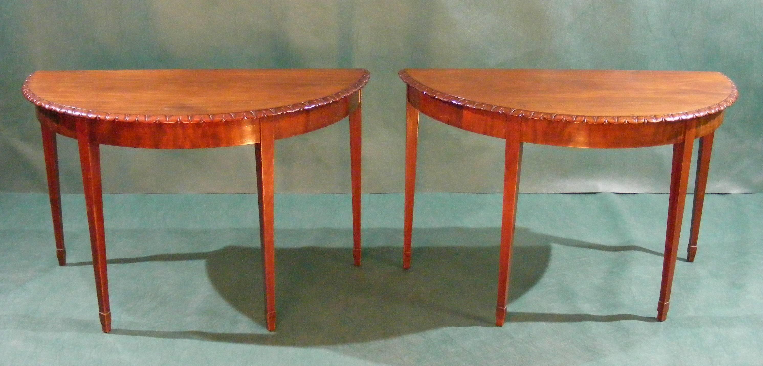 Antique mahogany dining table with demilune semicircular ends. Measures: 243 cm long by 123 cm x 77 cm high.
As can be seen from the illustrations this table may be used in many ways e.g. one has a pair of semicircular circular side tables.
The