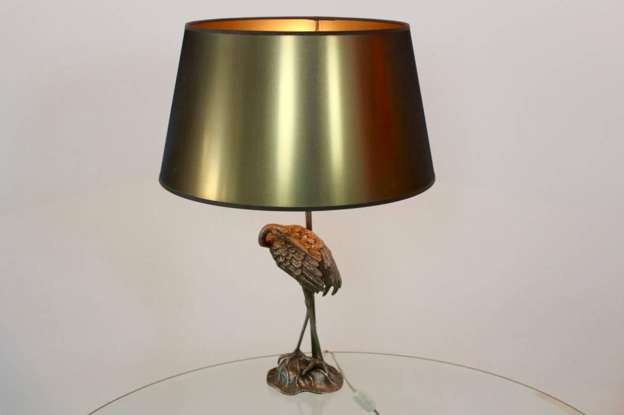A truly eye-catching, unusual iron bronzed metal table lamp, fashioned in the shape of a Heron. Designed by Maison Baguès. Produced circa 1970s. The Heron has a beautiful original patina. One of a kind and in excellent condition.

Since its
