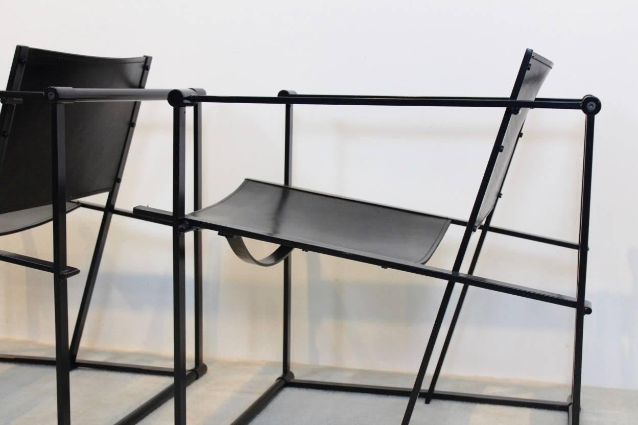 FM62 Cubic chair designed by Radboud van Beekum for Pastoe the Netherlands in the 1980s. Lacquered square metal frame with the back and seat in strong black Saddle Leather. Truly a unique piece with beautiful graphic design. 
The cube chair was